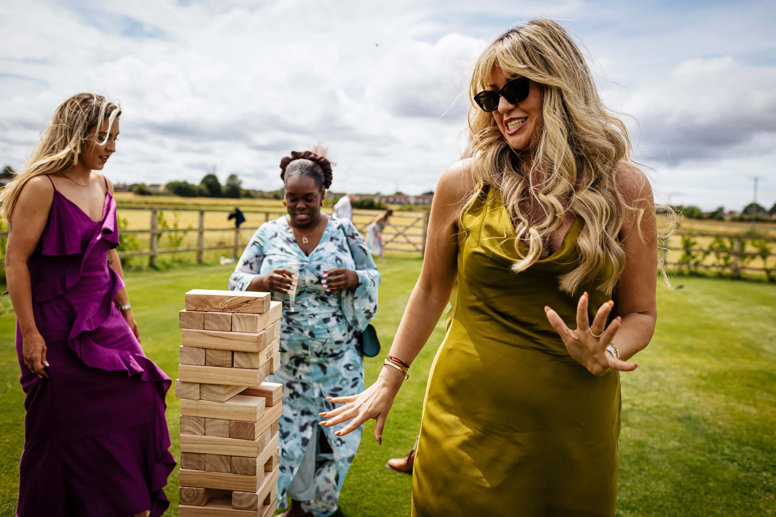 Playing giant jenga at a wedding in Yorkshire