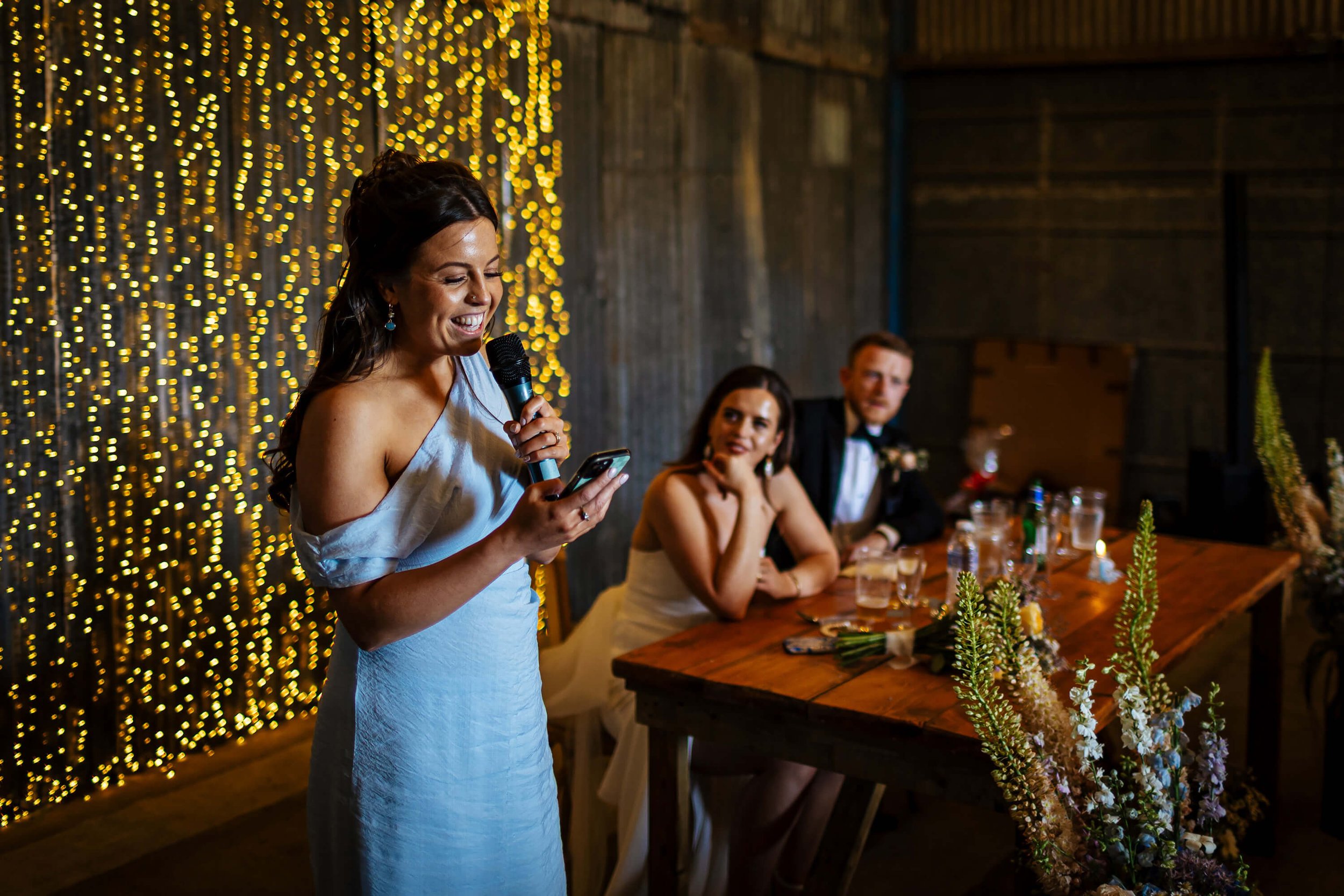 Maid of honour performing her speech at the wedding 