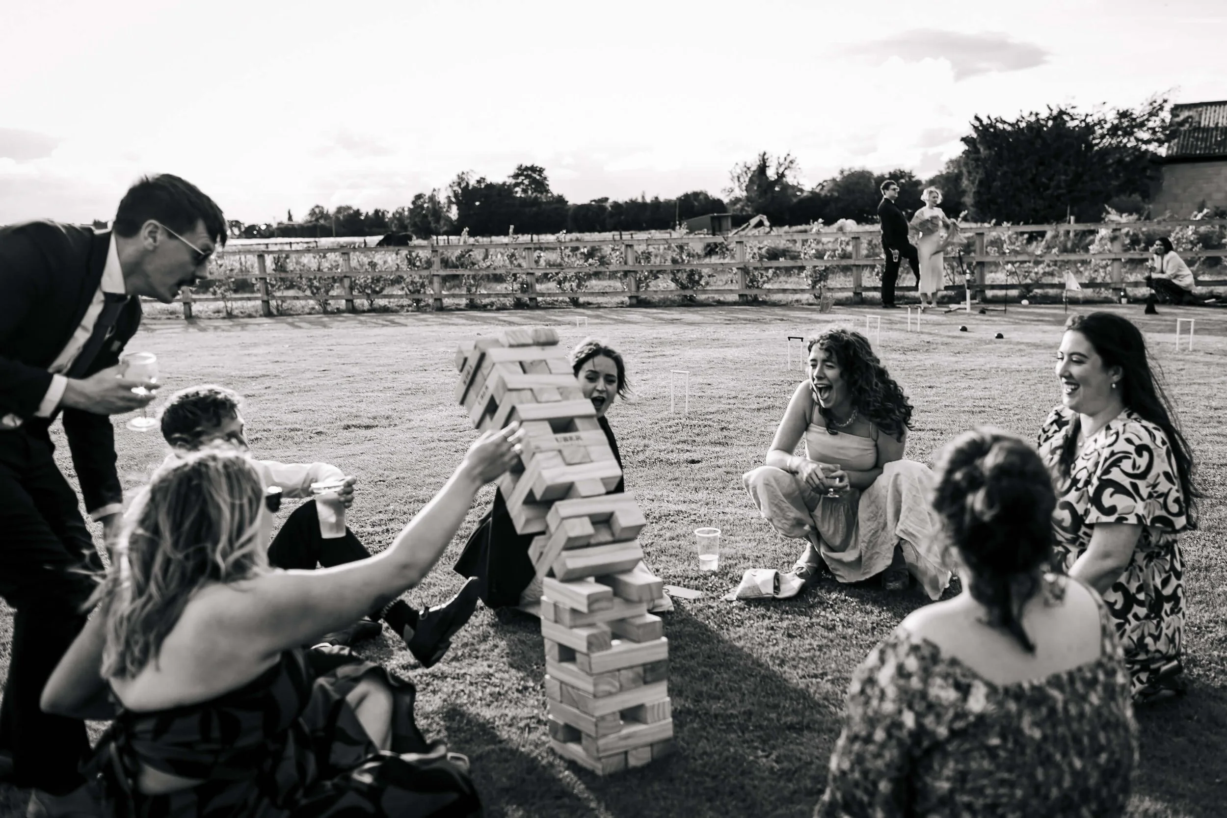 Giant jenga toppled at a wedding