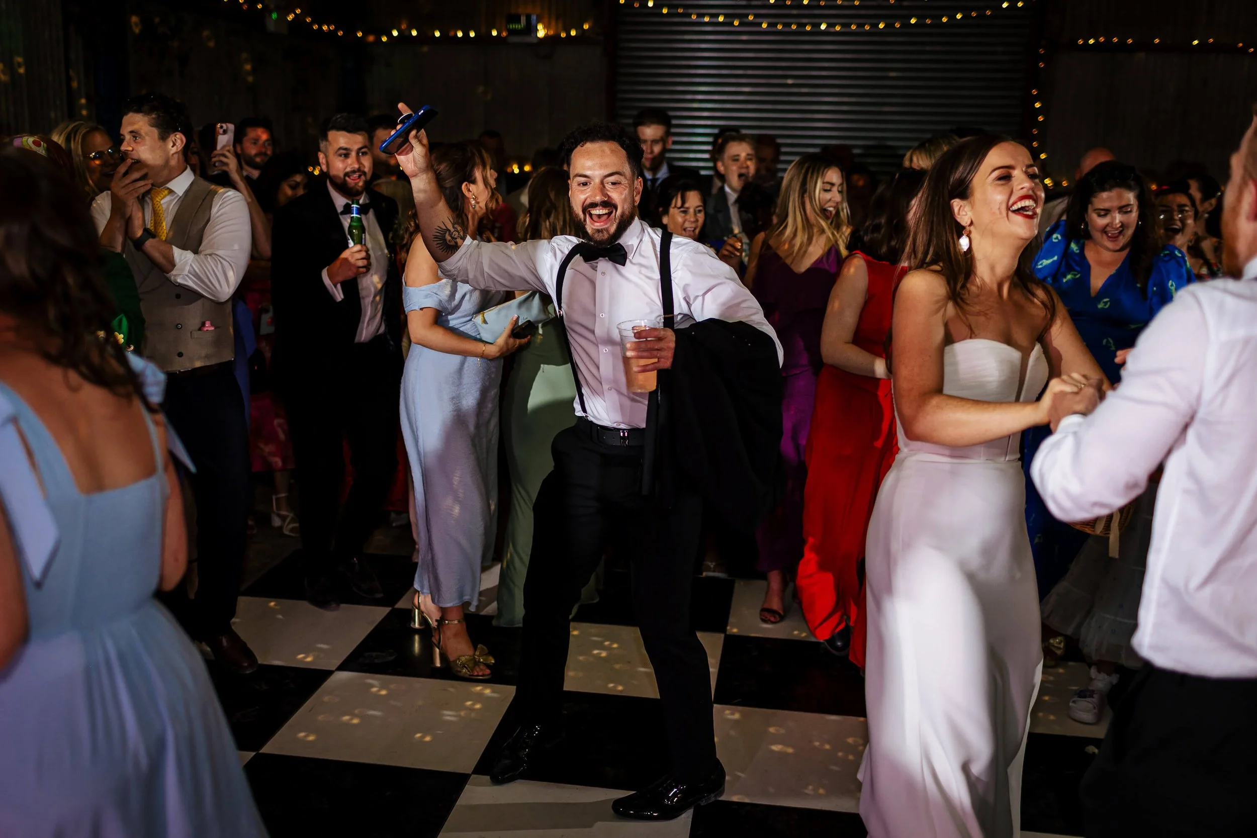 Guests dancing and having fun at a wedding