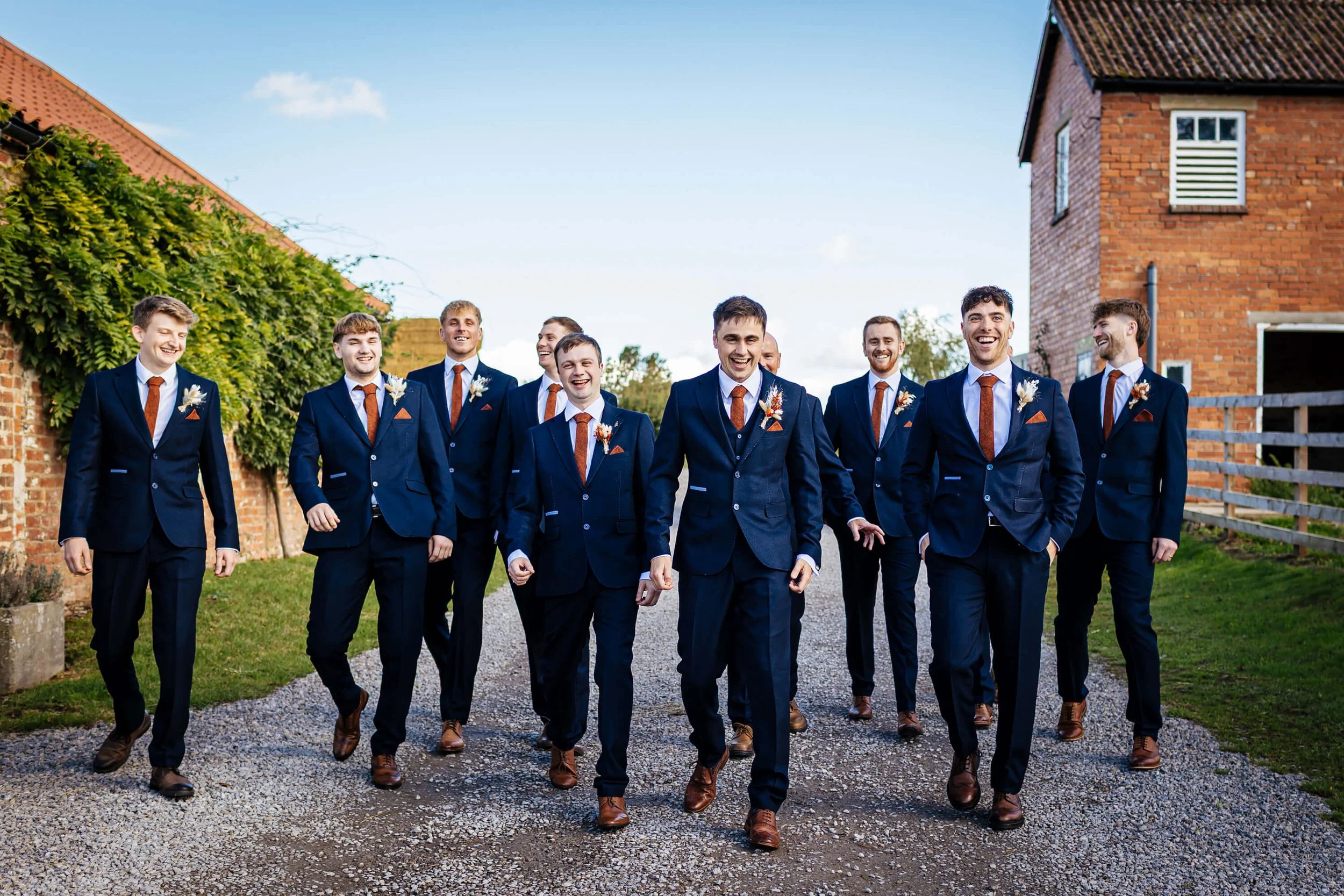 Groomsmen walking to the wedding ceremony