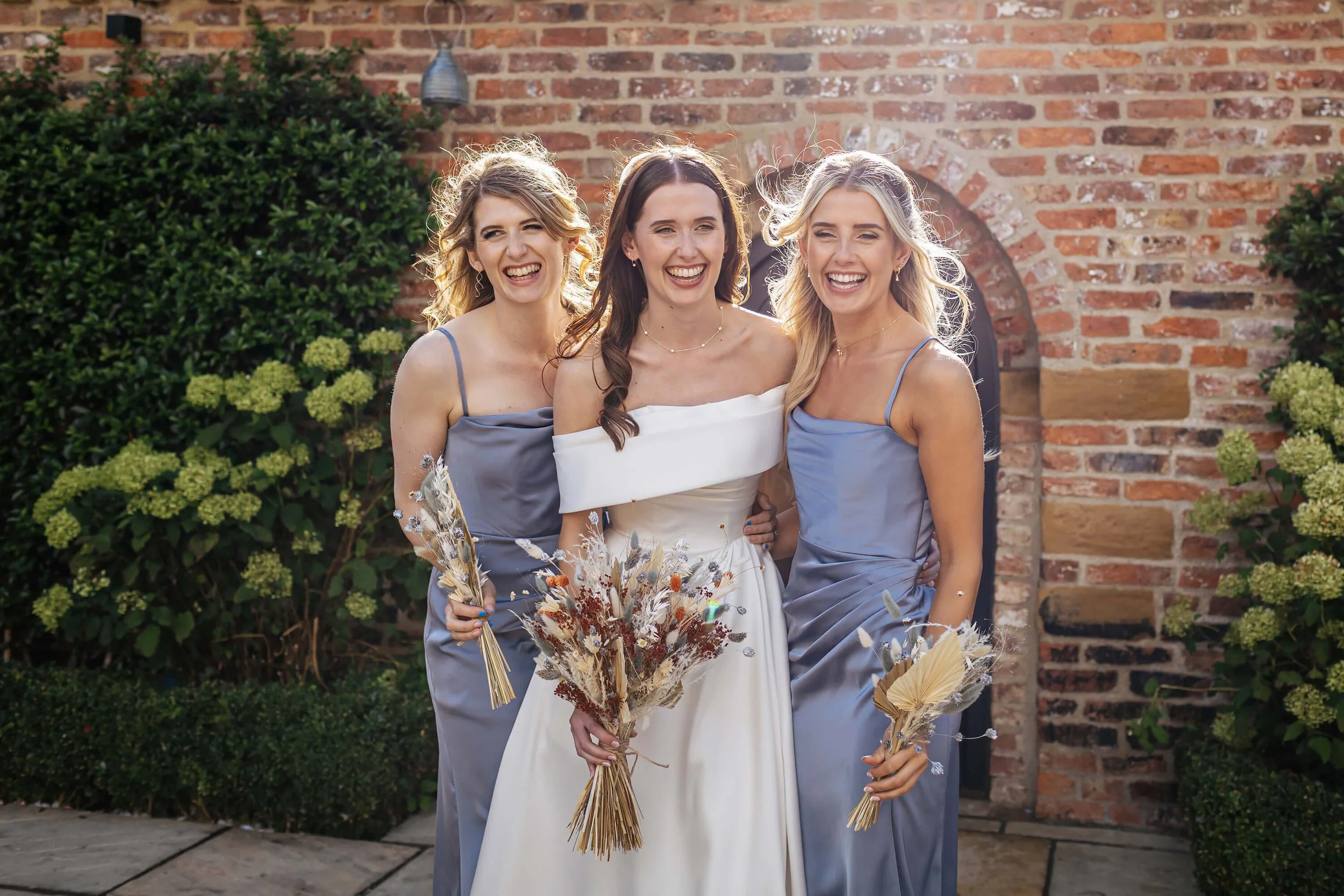 Bridesmaids photo in the courtyard at Thirsk Lodge Barns