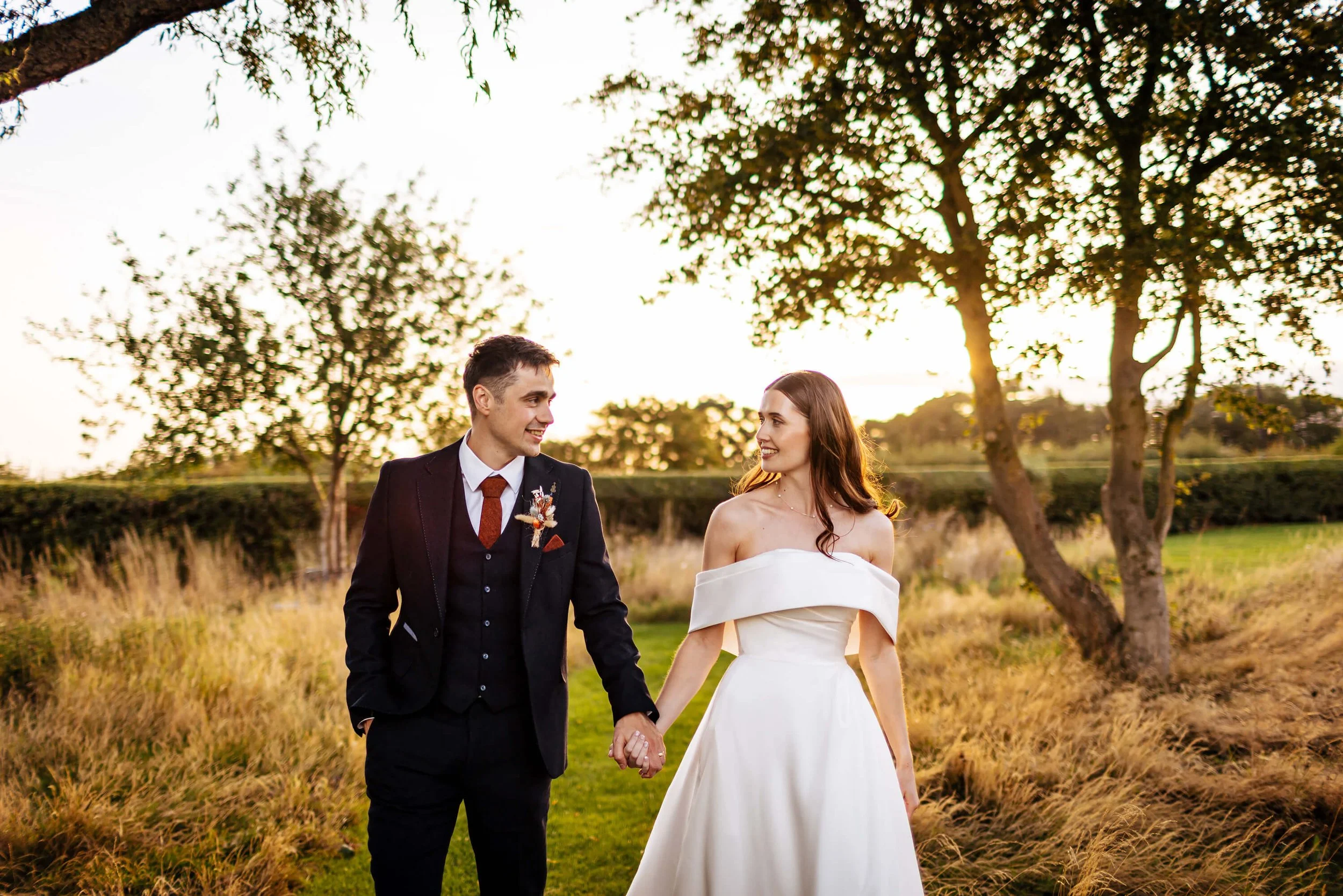 Sunset portrait with the bride and groom on their wedding day