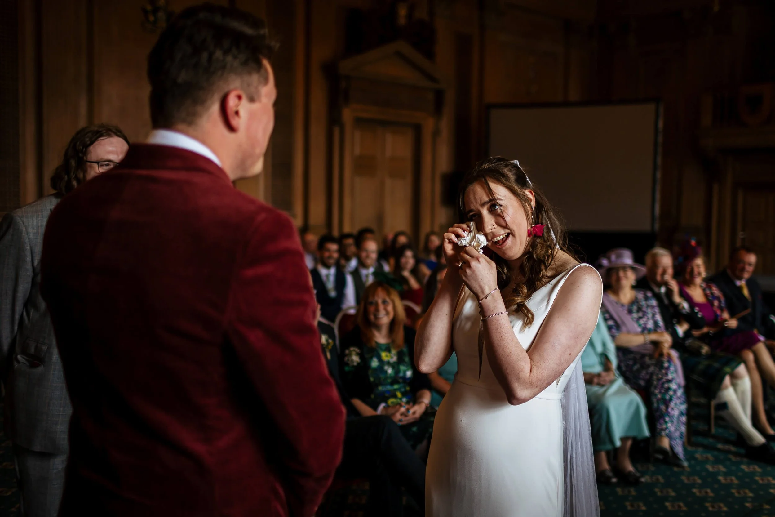 Bride gets emotional during her wedding ceremony