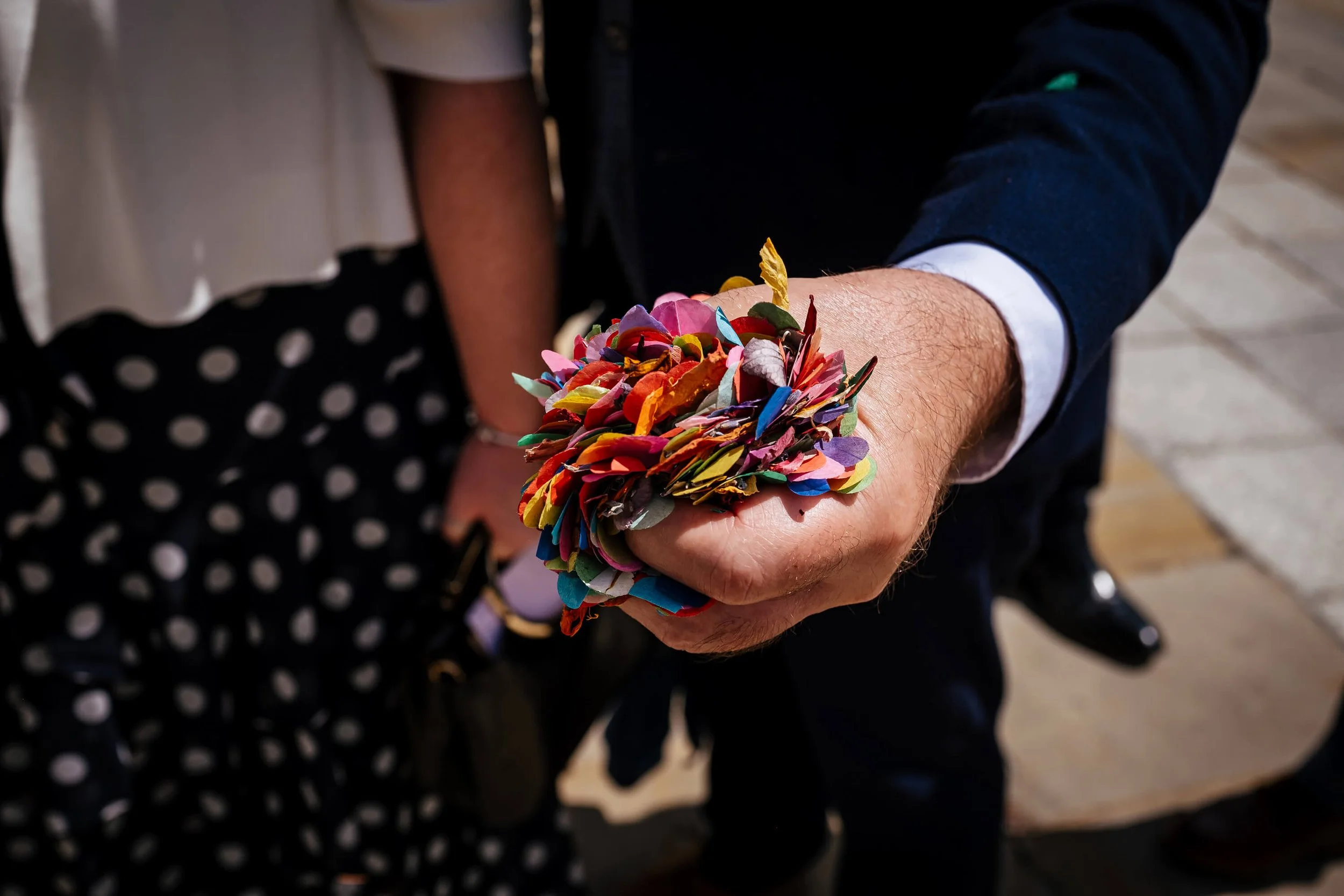 A handful of confetti to throw on the bride and groom
