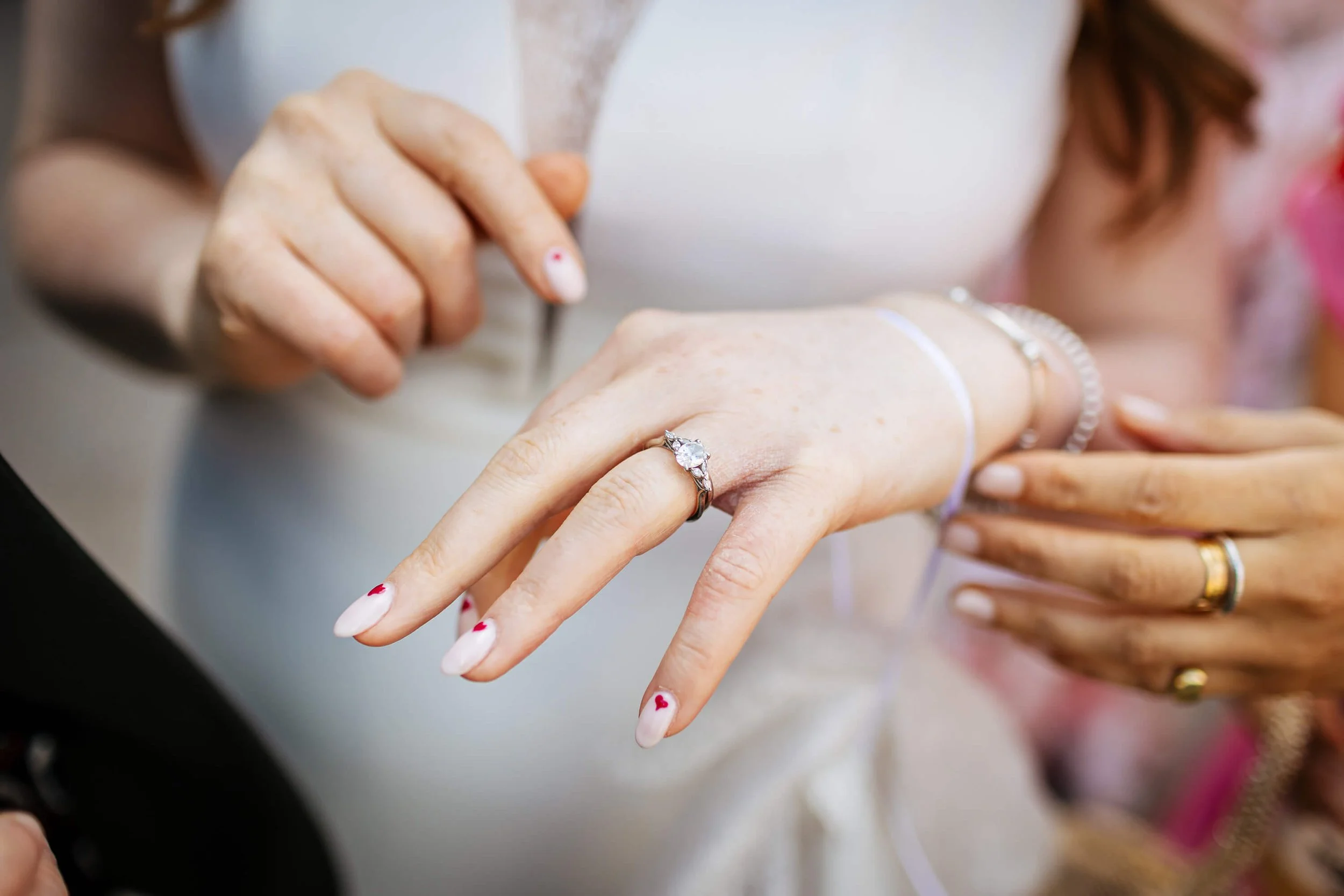 Bride showing off her new wedding ring
