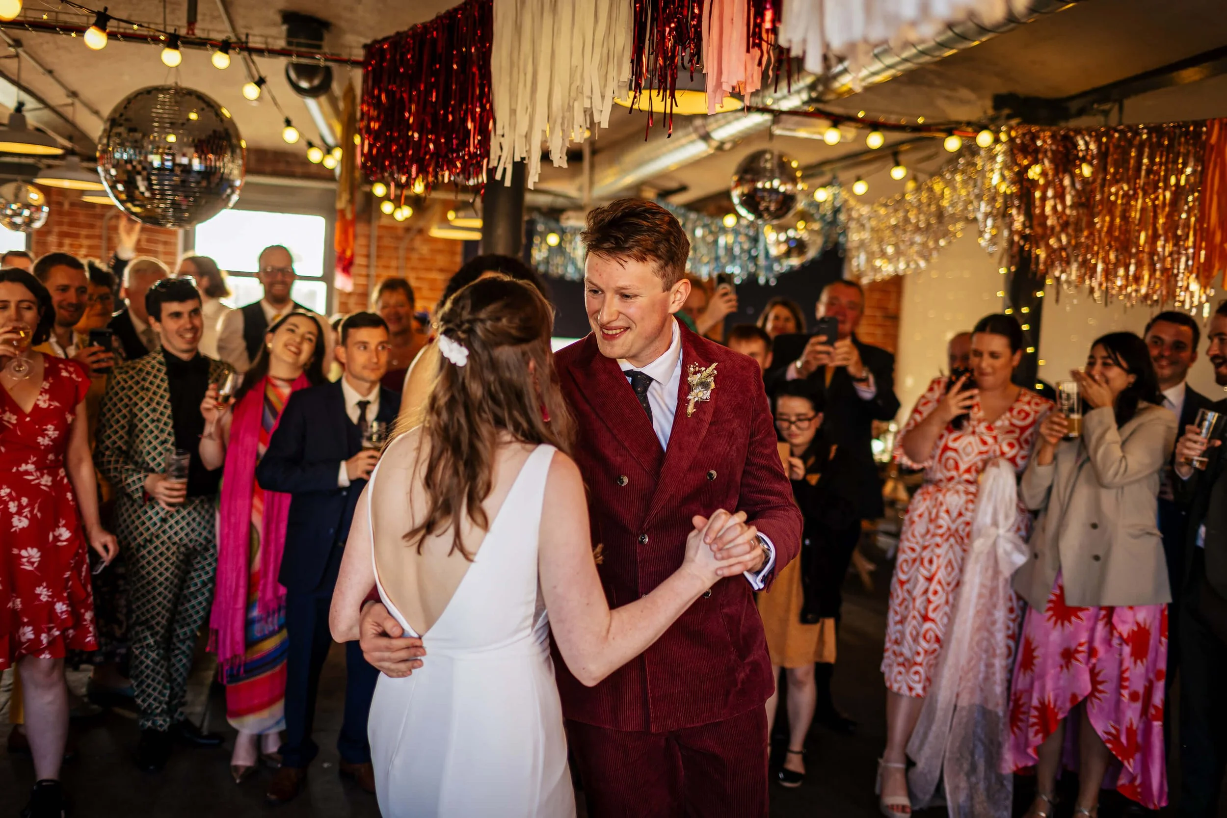 Bride and groom perform their first dance at a Northern Monk Refectory wedding