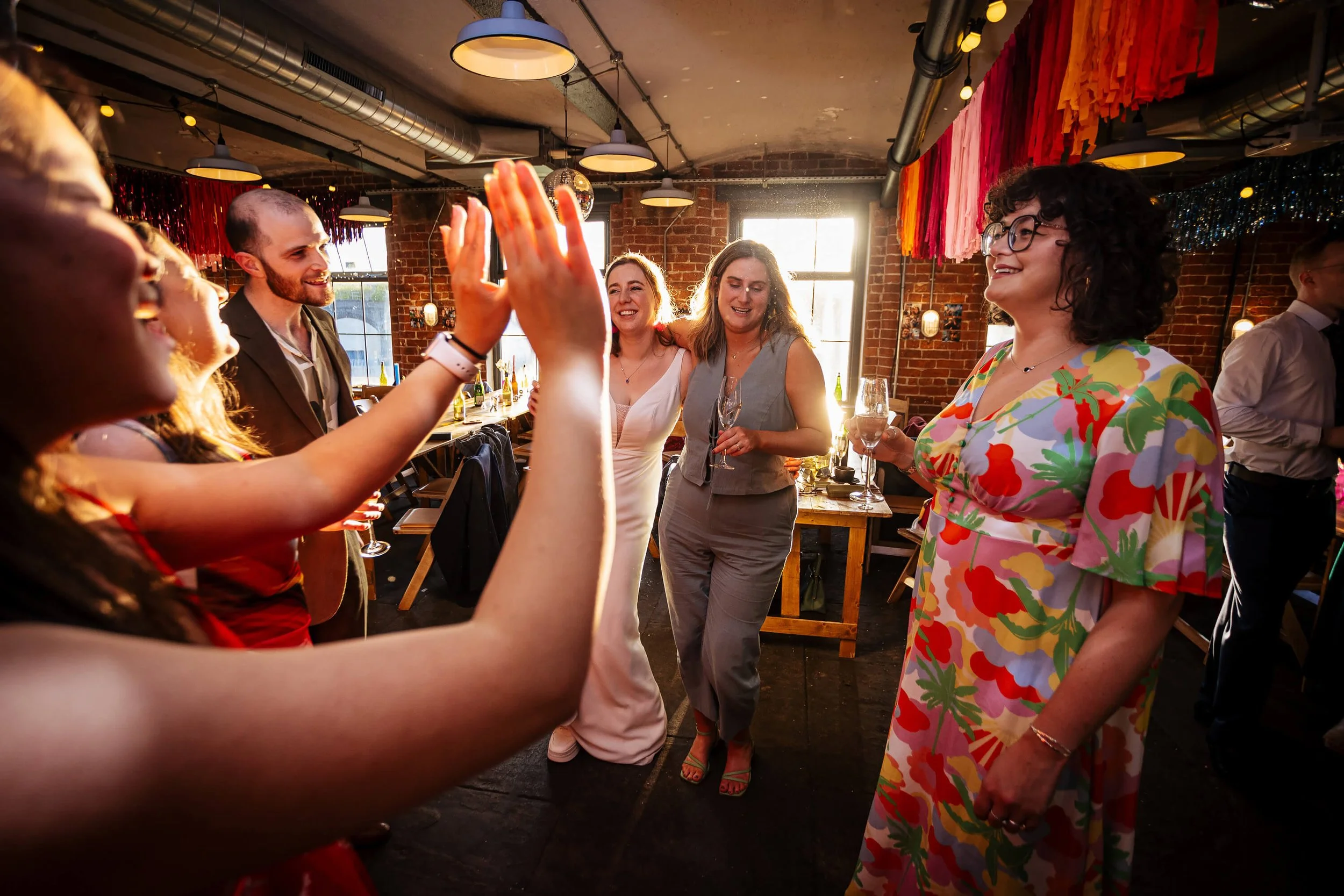Bride and wedding guests on the dance floor in Leeds