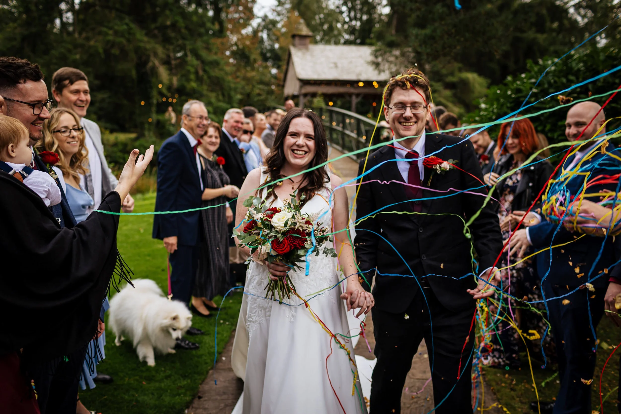 Confetti ribbons thrown on the couple at a wedding