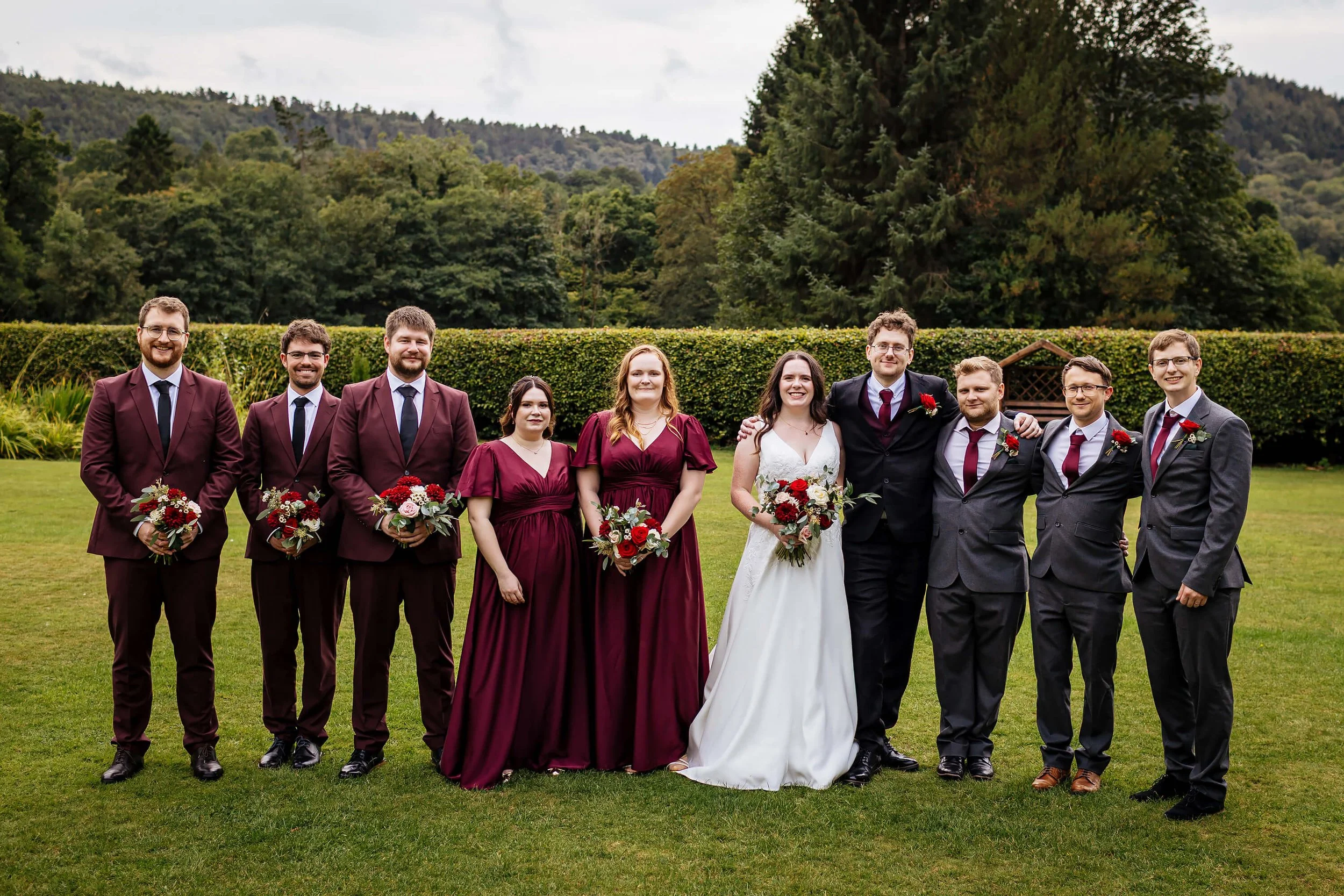 Bridesmaids and groomsmen group photo at a wedding