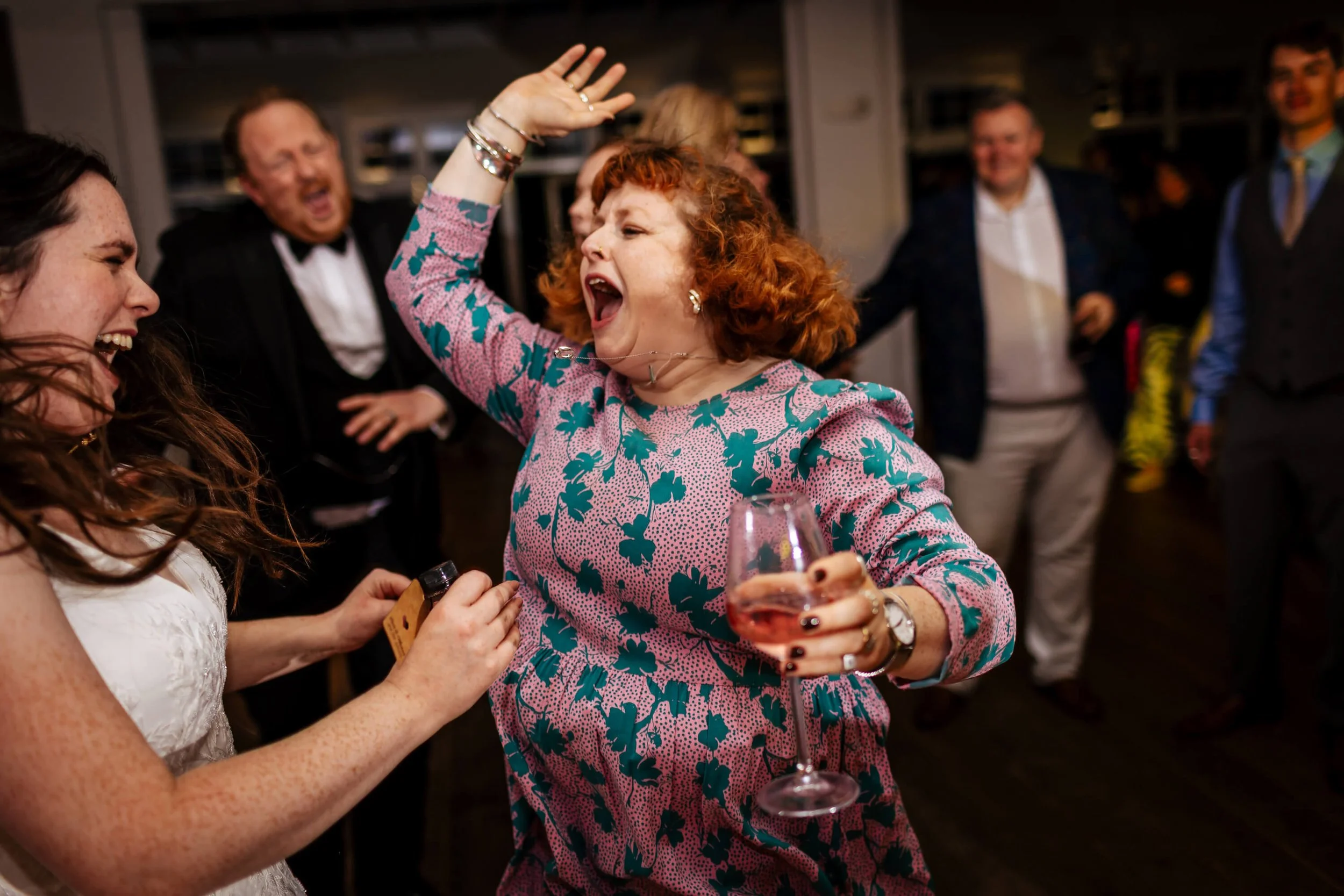Friends dancing at a wedding in Yorkshire