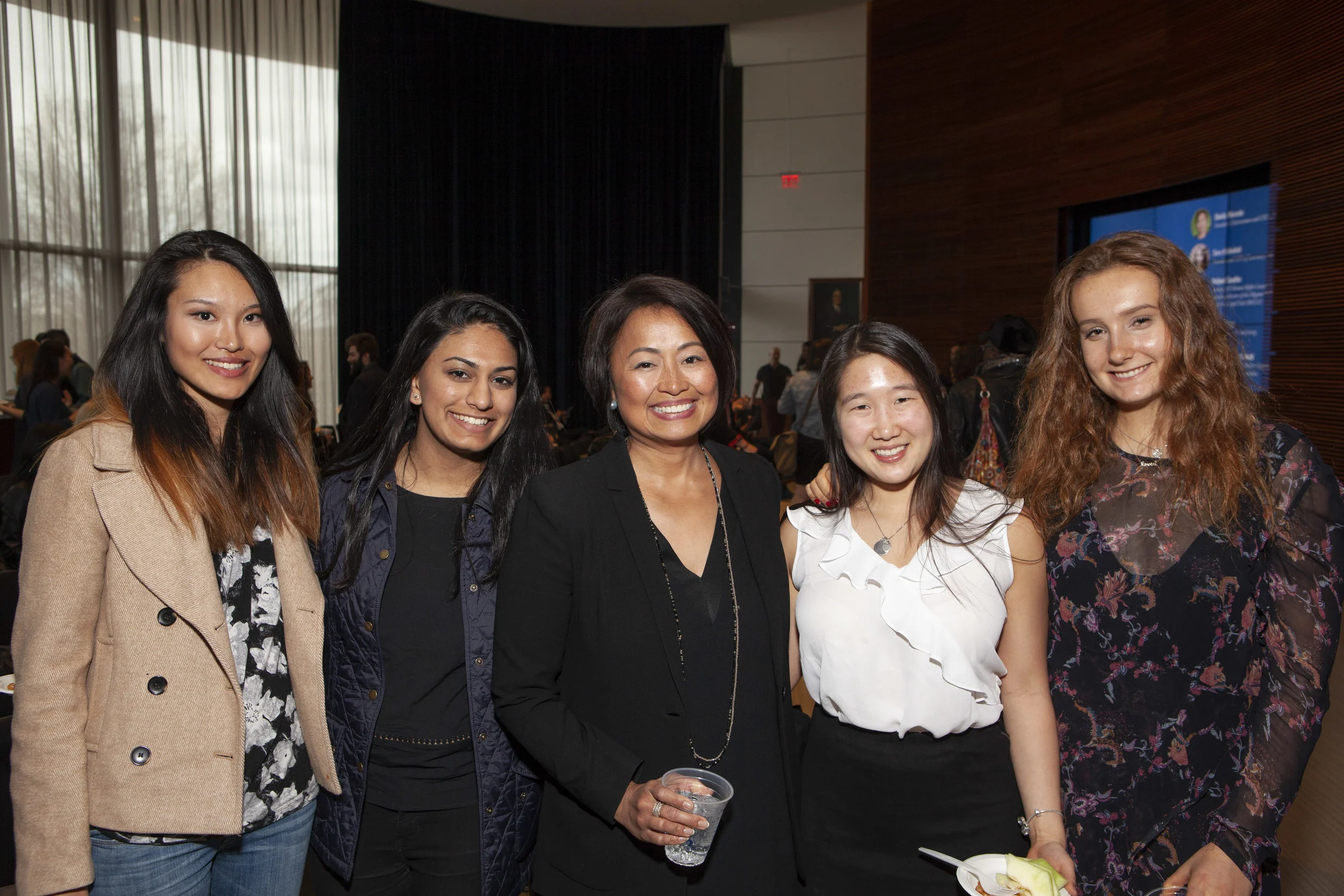 Sheila Marcelo (center), Founder, Chairwoman and CEO of Care.com, with students at the WE@Yale Summit