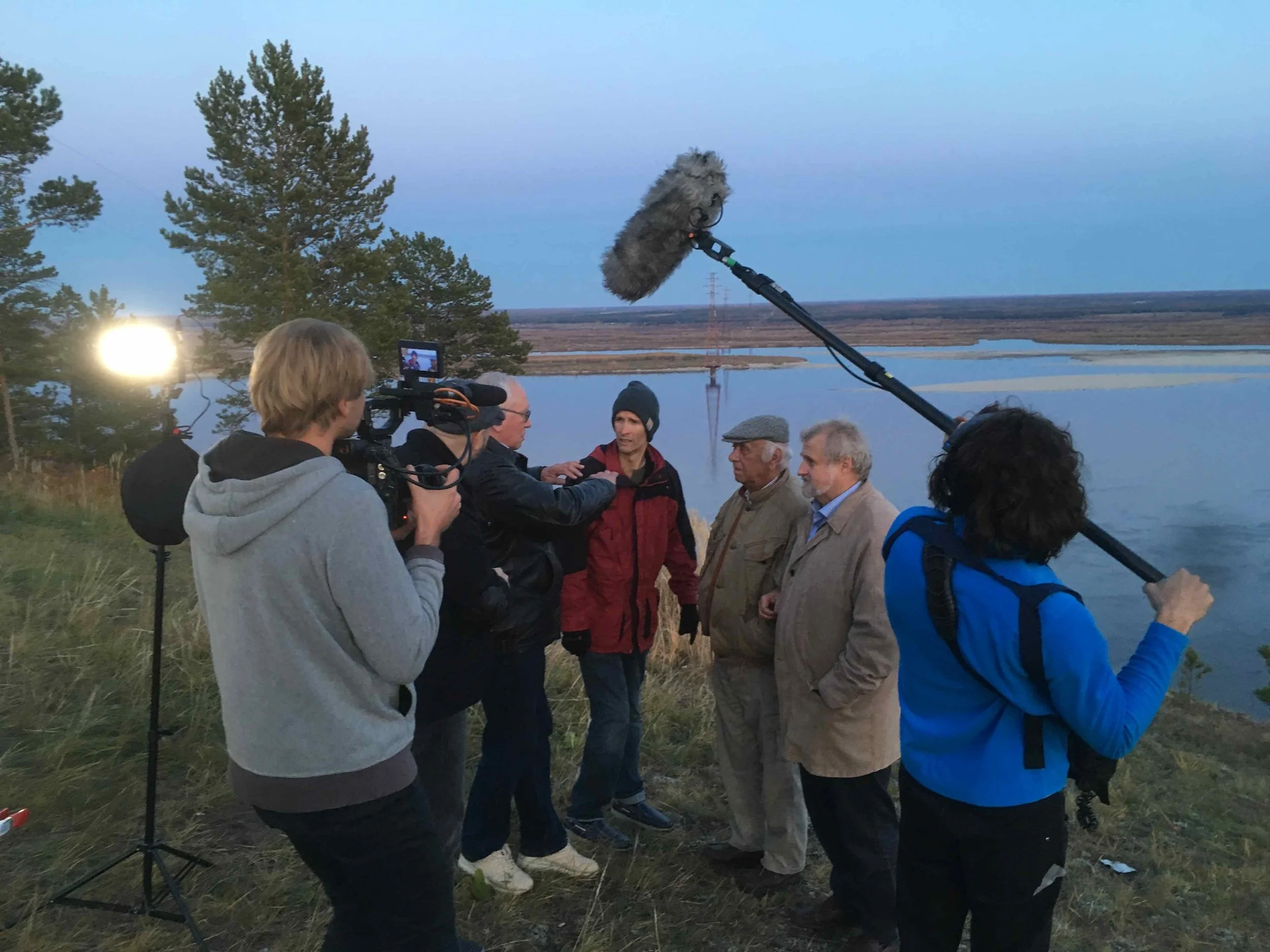 Dr. Aleksandr Kugaevskii, director of the M.K. Ammosov North-Eastern Federal University Finance and Economics Institute in Yakutsk, shows InterContinental Railway Chief Project Advisor Scott Spencer and ICR co-founders George Koumal and Victor Razbegin where a bridge will one day cross the Lena River, connecting Yakutsk to Tabaga and linking to the railway at Nizhny Bestyakh, which will continue toward the Bering Strait