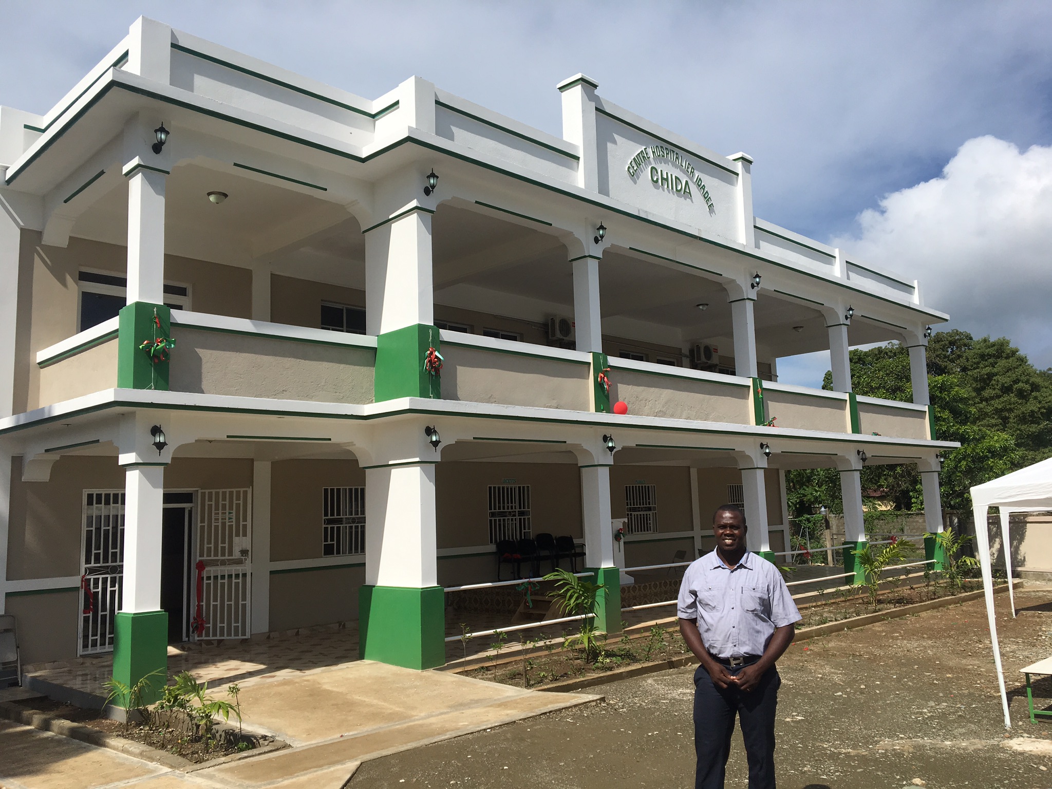  Dr. Wislyn Avenard (PKF Medical Director in Haiti) poses for a photo outside of the newly opened CHIDA Hospital in Cap Haitien, Haiti. 