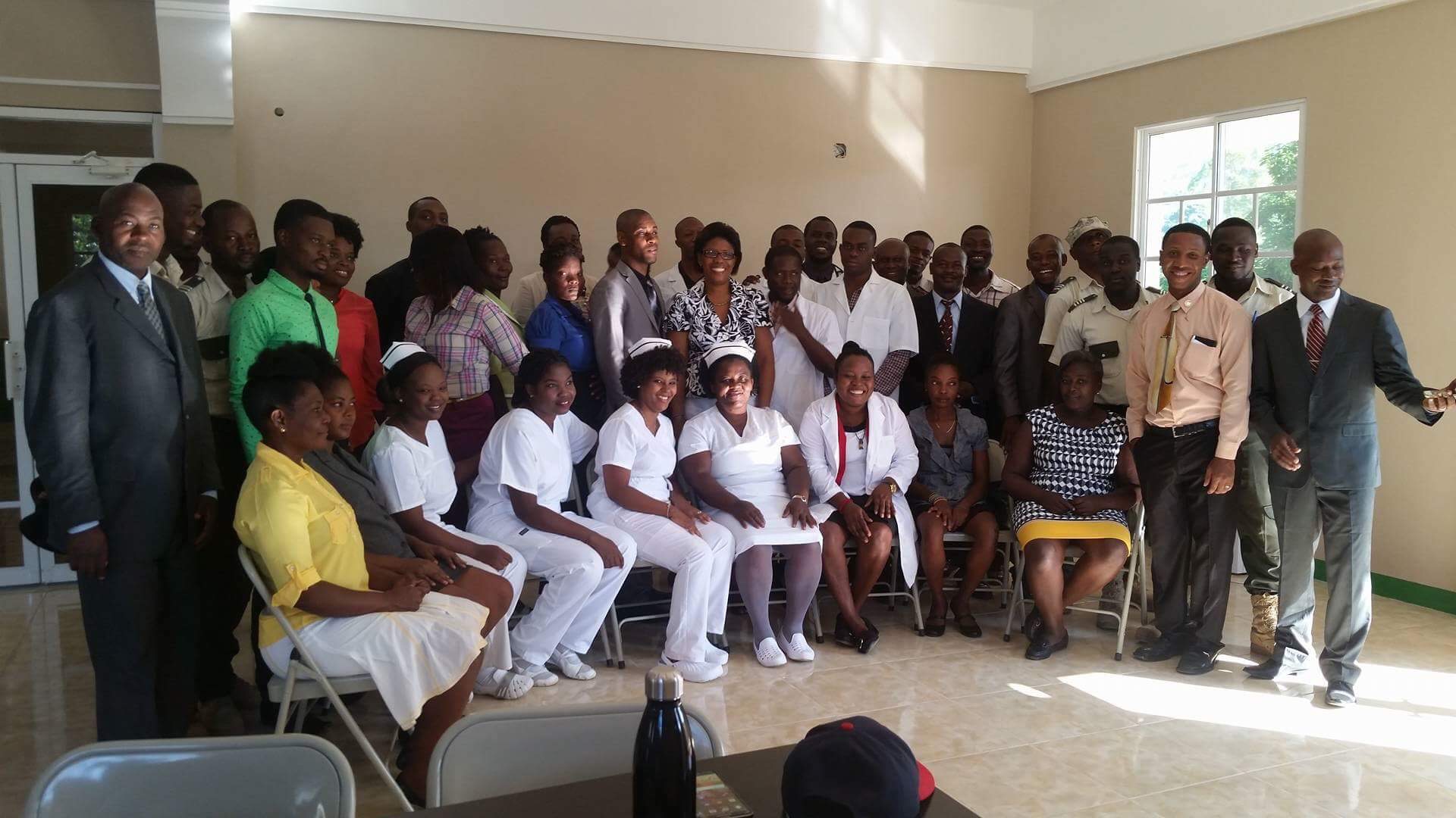  The staff poses for a photo just outside of the newly opened CHIDA Hospital in Cap Haitien, Haiti 