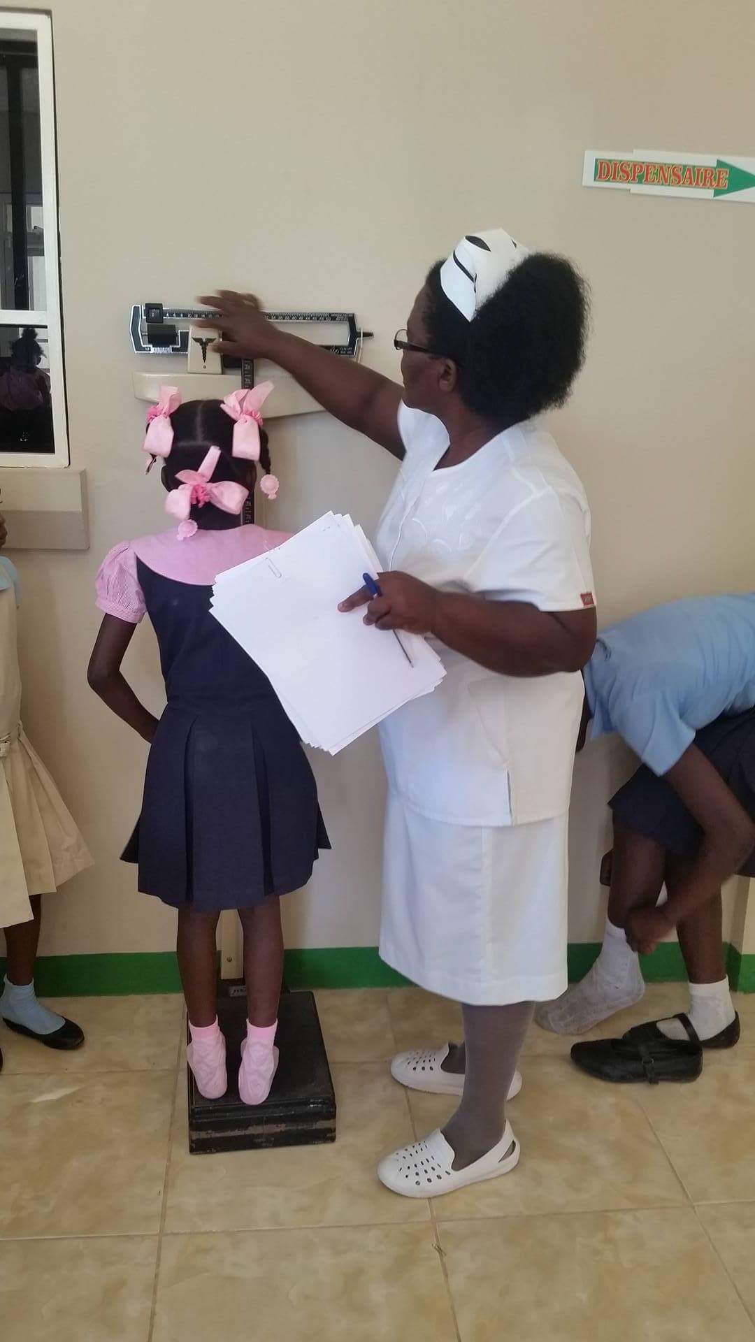  A young girl gets her height and weight measurements taken at the the newly opened CHIDA Hospital in Cap Haitien, Haiti 