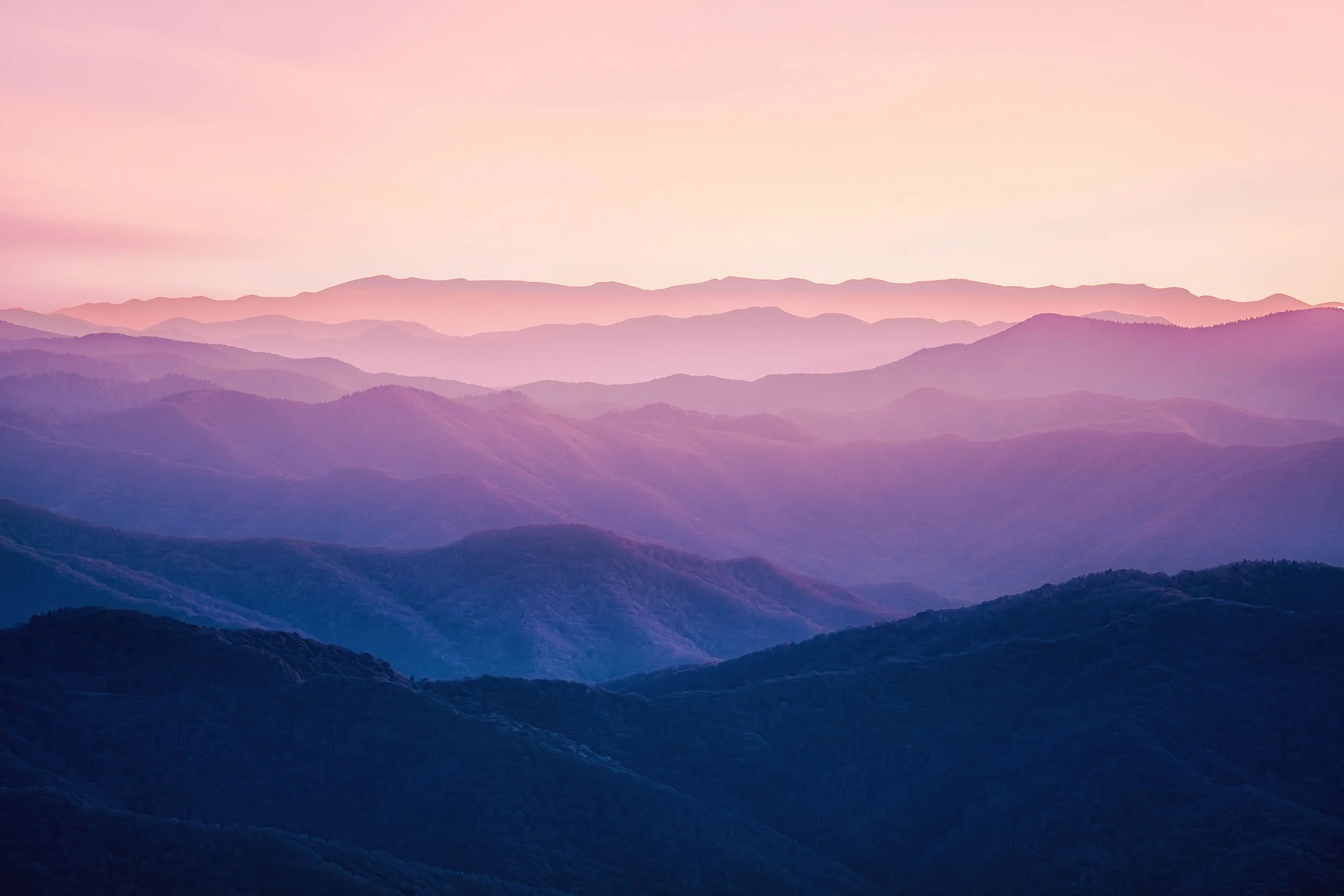 Sunrise over layered ridgelines from Clingmans Dome (Kuwohi), Great Smoky Mountains National Park, by Ryan L. Smith
