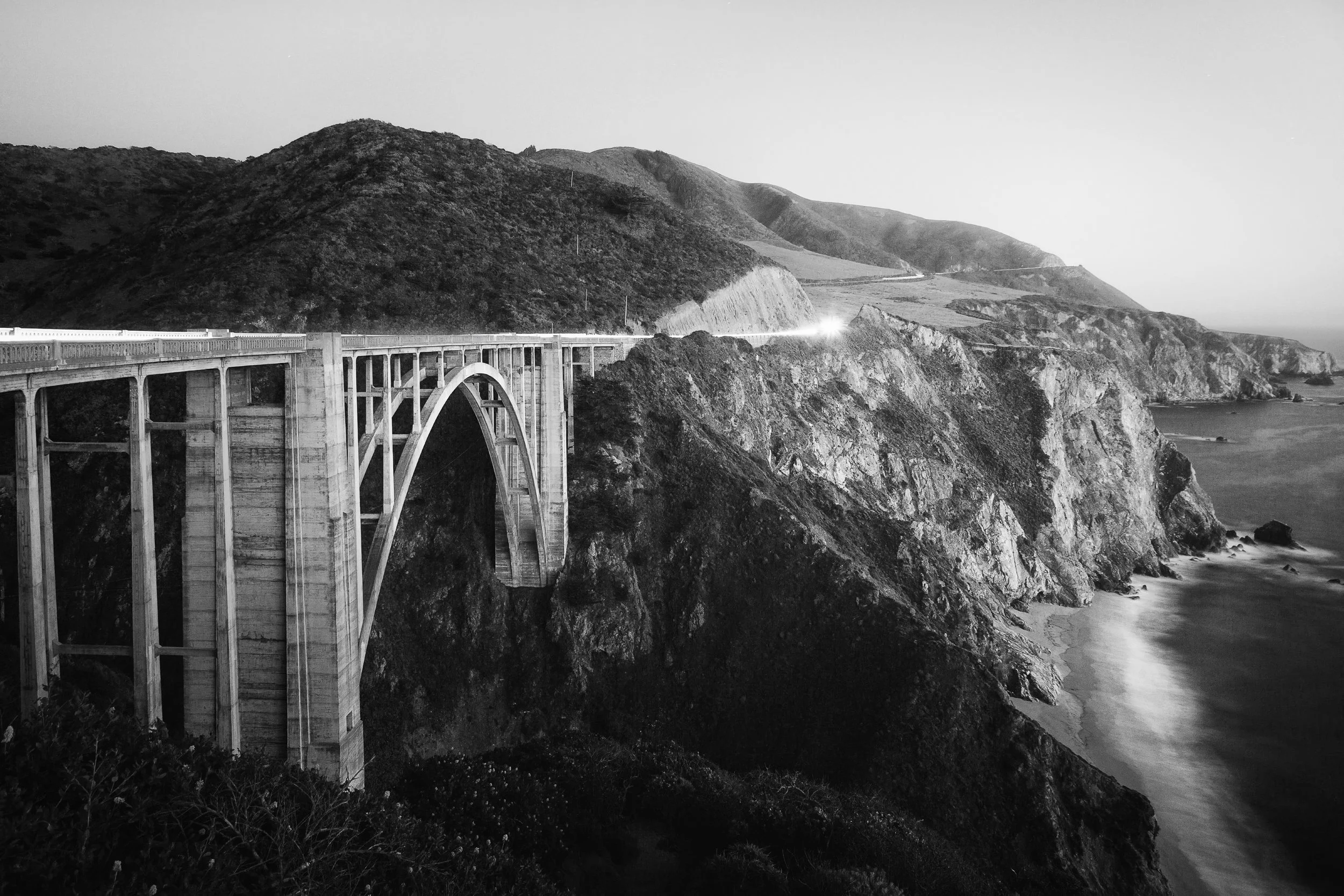 Black and white photograph of Bixby Bridge on the Big Sur coast, California, by Ryan L. Smith