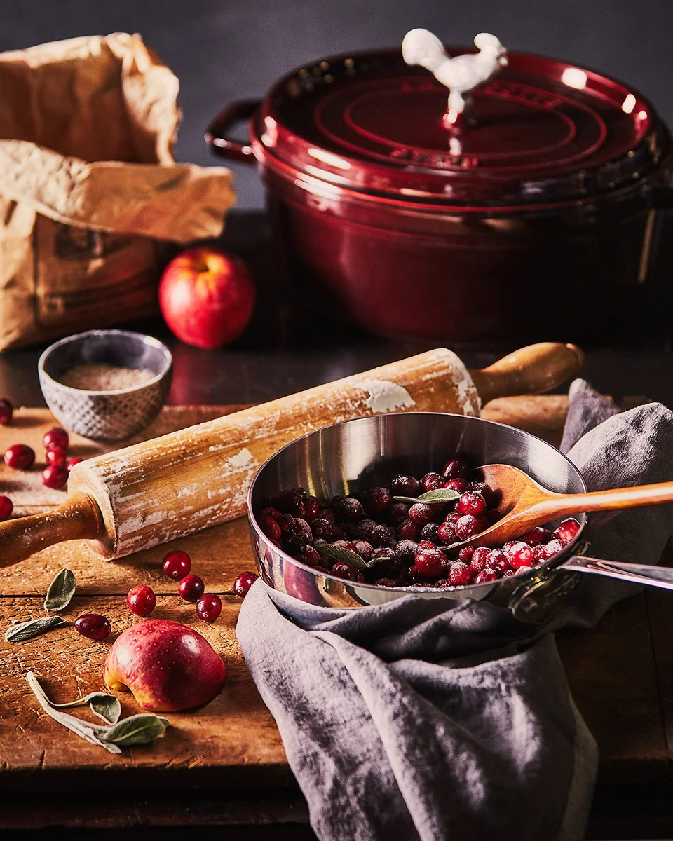 Le Creuset cookware product photography with fresh ingredients