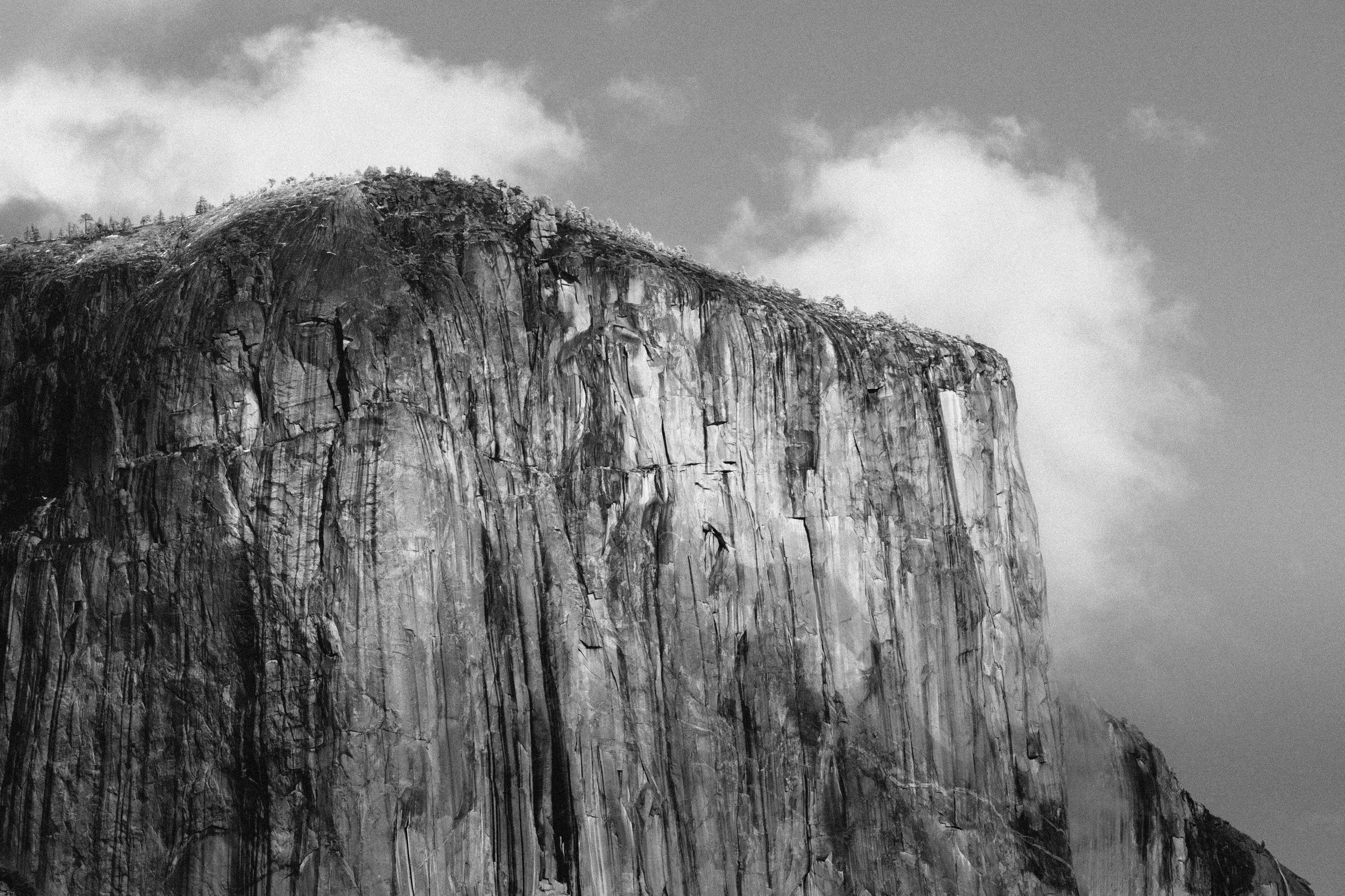 A tight black and white study of the summit of El Capitan seen from Tunnel View, Yosemite National Park, California, by Ryan L. Smith