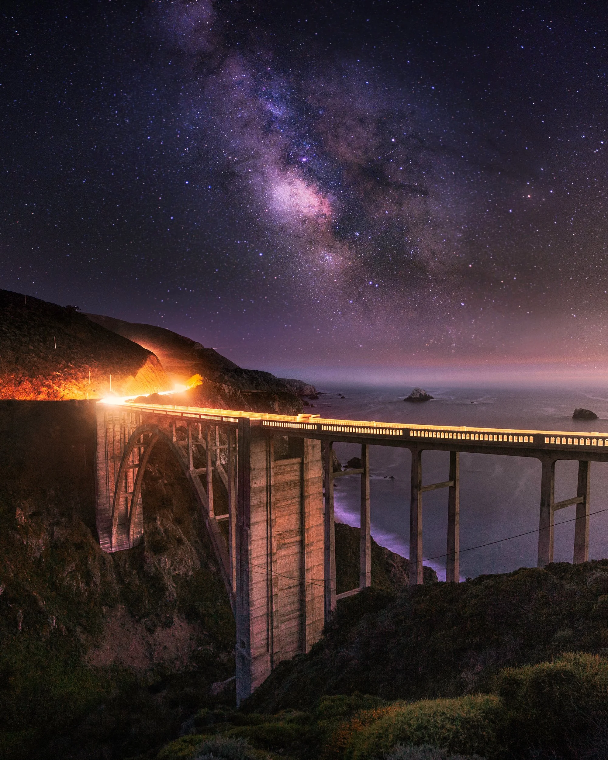 The Milky Way arching over Bixby Bridge along the Big Sur coast, California, night landscape print by Ryan L. Smith