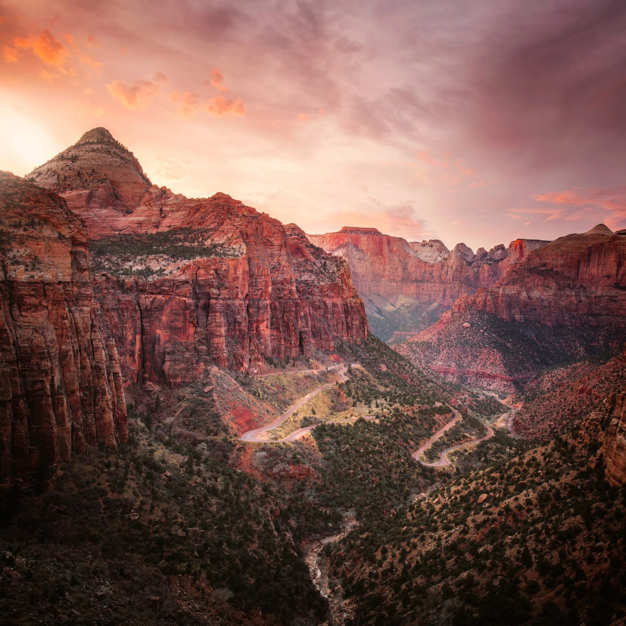 Warm sunset glow on the sandstone canyon walls of Zion National Park, Utah, by Ryan L. Smith