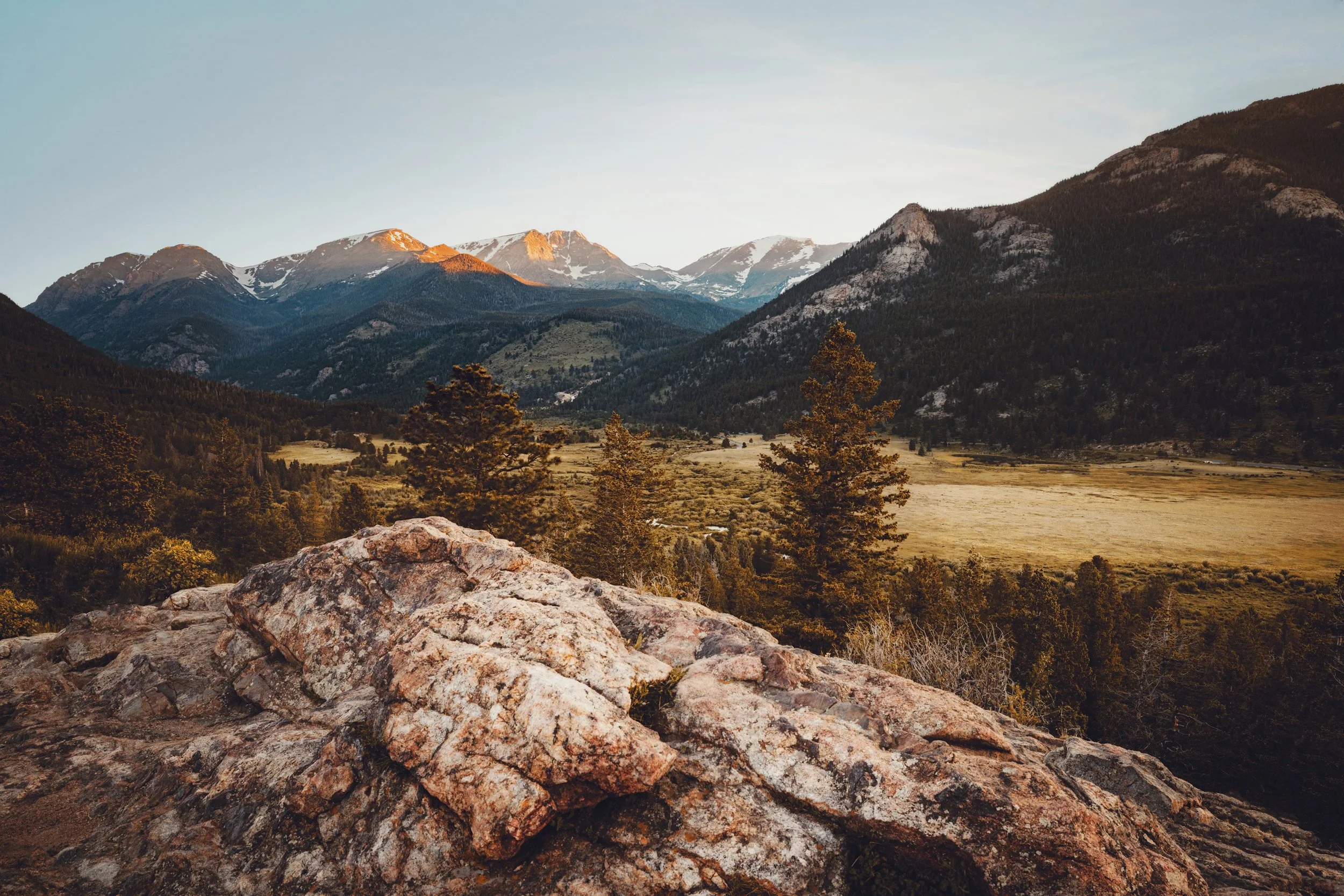 A golden light view over Horseshoe Park from an overlook along the route up to Trail Ridge Road, Rocky Mountain National Park, Colorado, by Ryan L. Smith