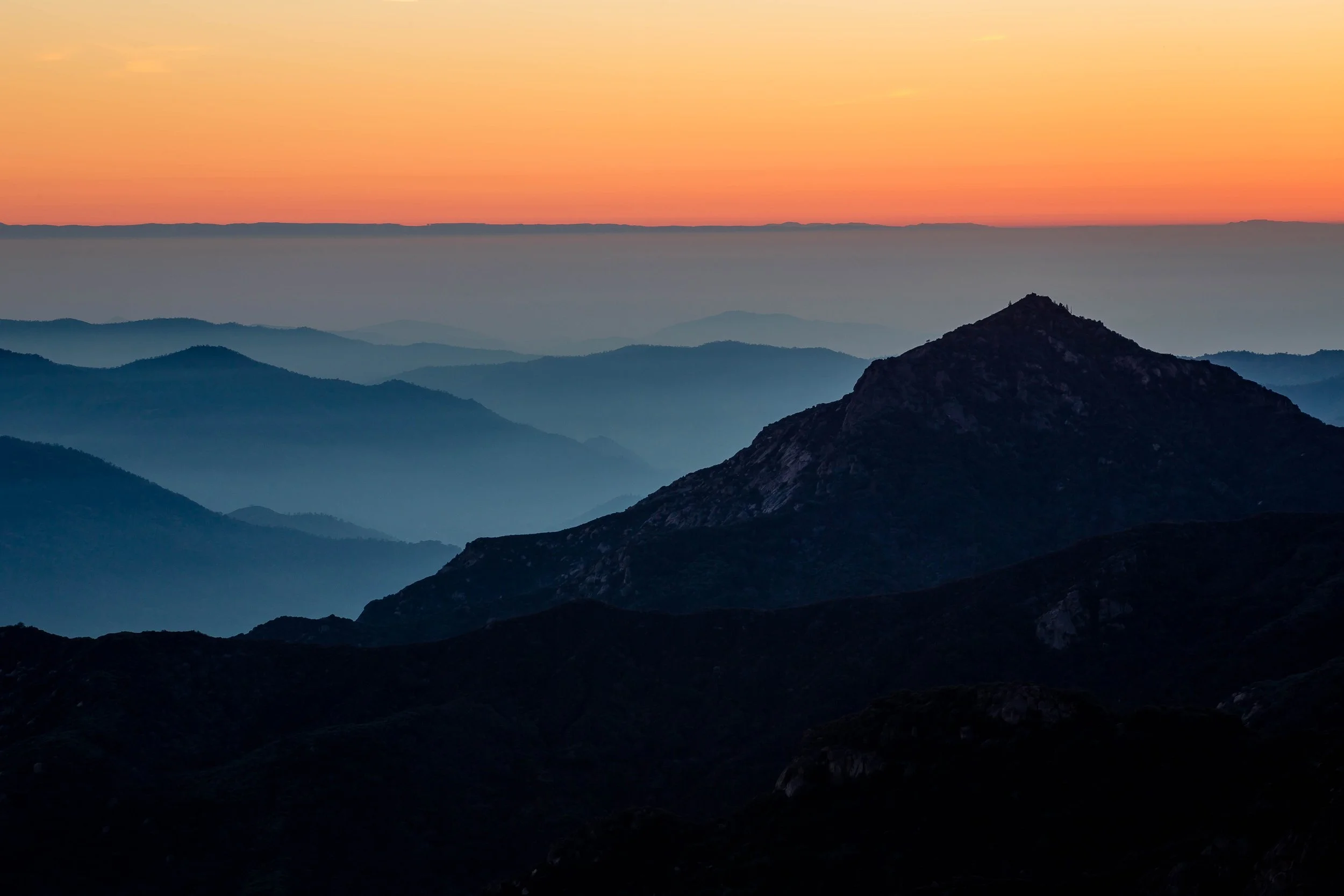A quiet sunset over the peaks of Kings Canyon National Park, California, by Ryan L. Smith