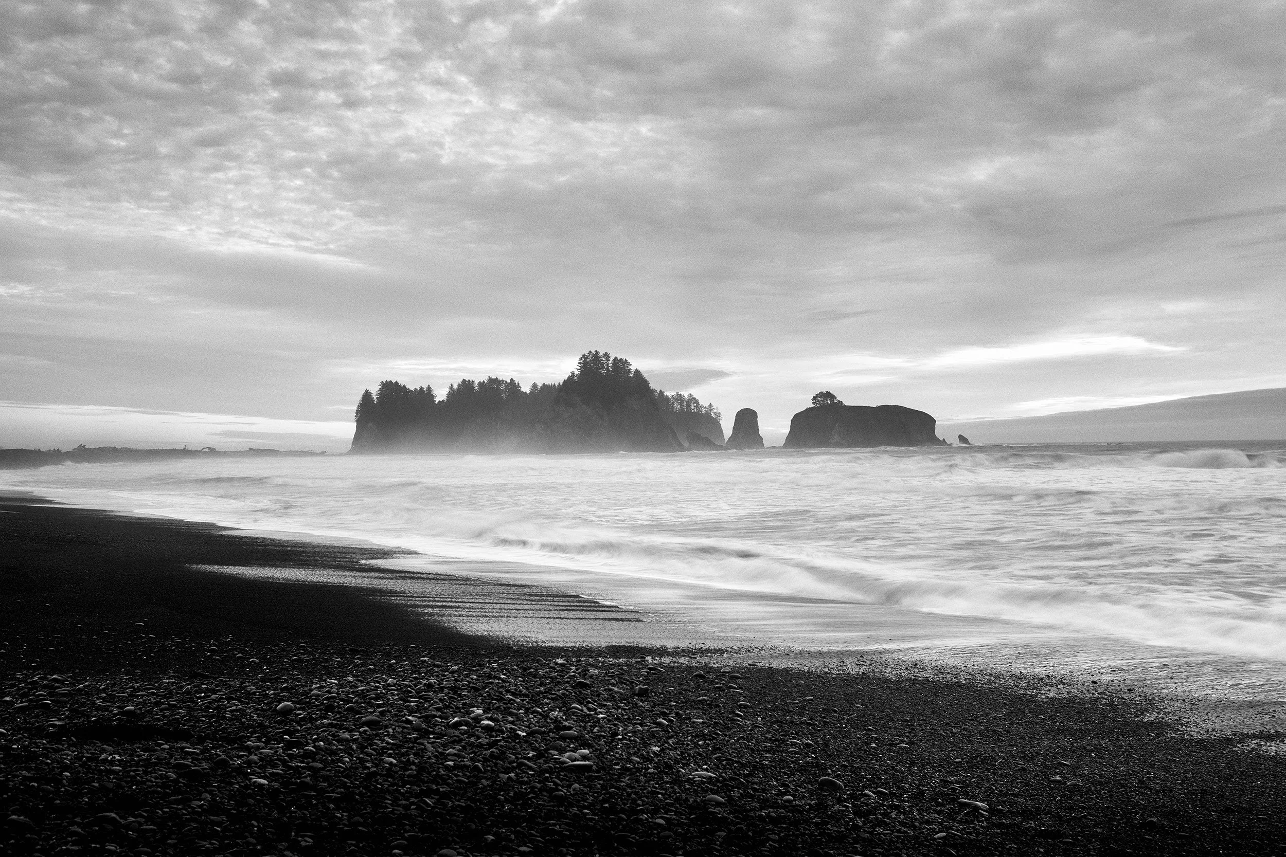 Black and white photograph of the sea stacks at Rialto Beach, Olympic National Park, Washington, by Ryan L. Smith