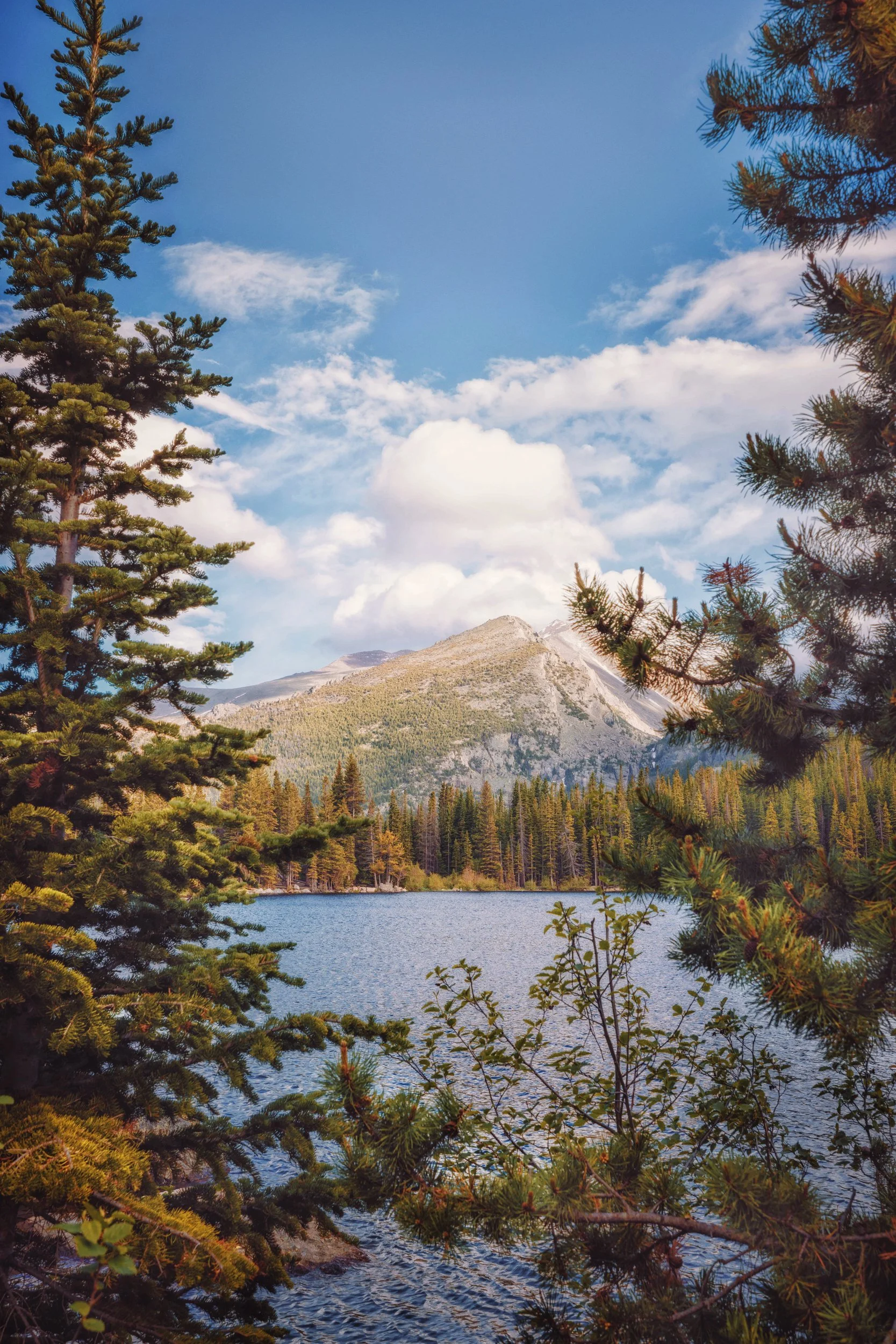 A summer afternoon at Bear Lake with peaks reflected in clear water, Rocky Mountain National Park, Colorado, by Ryan L. Smith