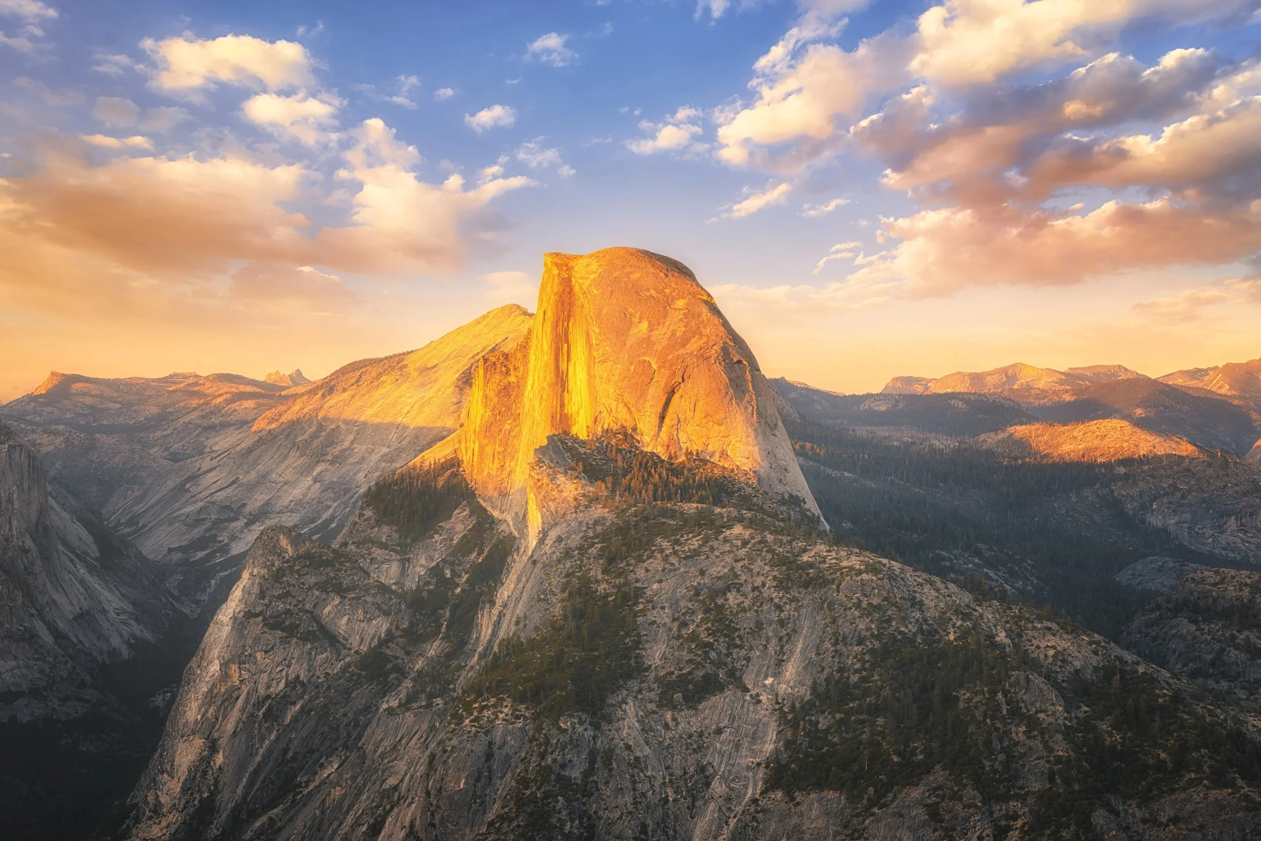Sunset light on Half Dome rising above Yosemite Valley, Yosemite National Park, California, by Ryan L. Smith