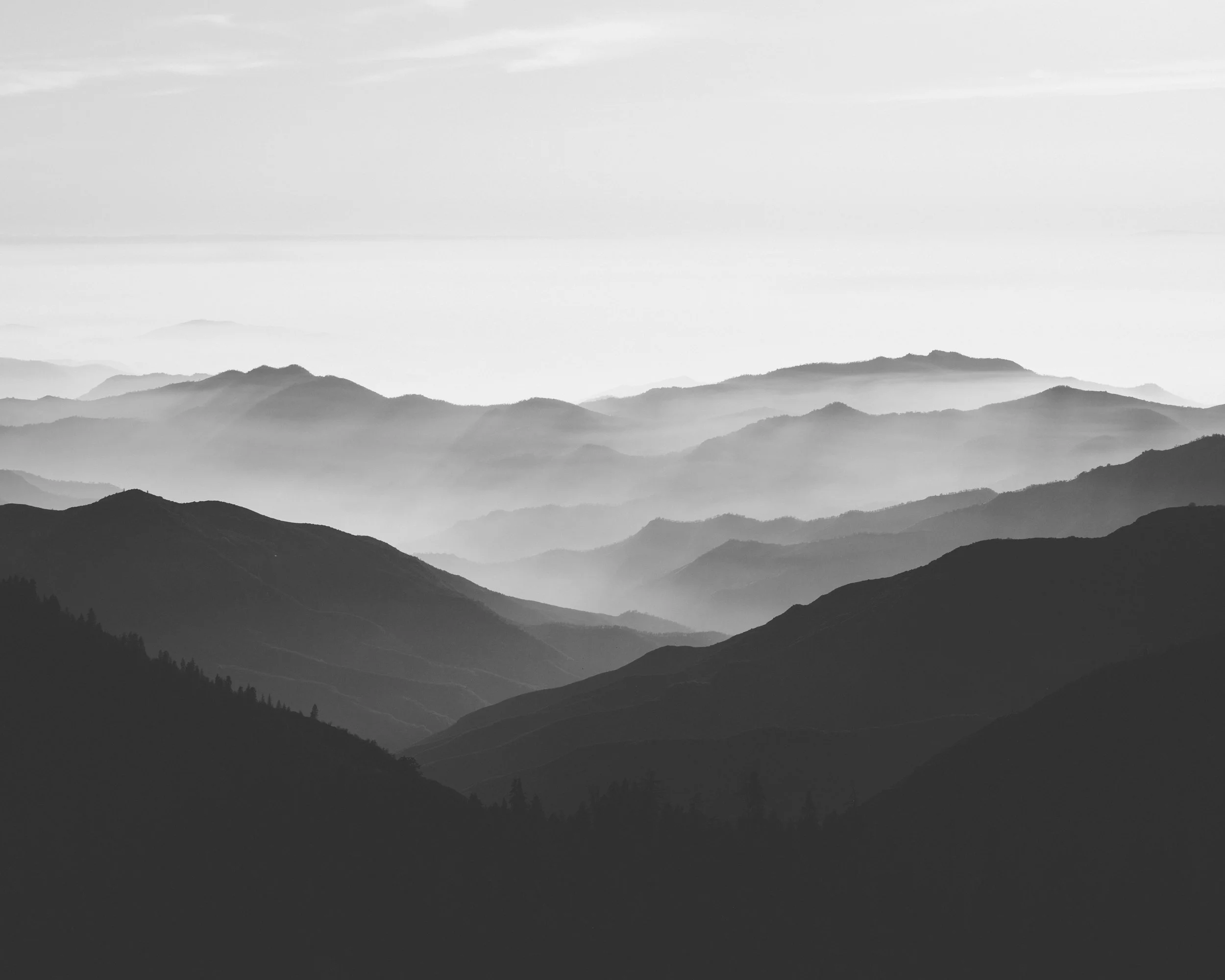 Black and white photograph of a quiet sunset over Kings Canyon National Park, California, by Ryan L. Smith