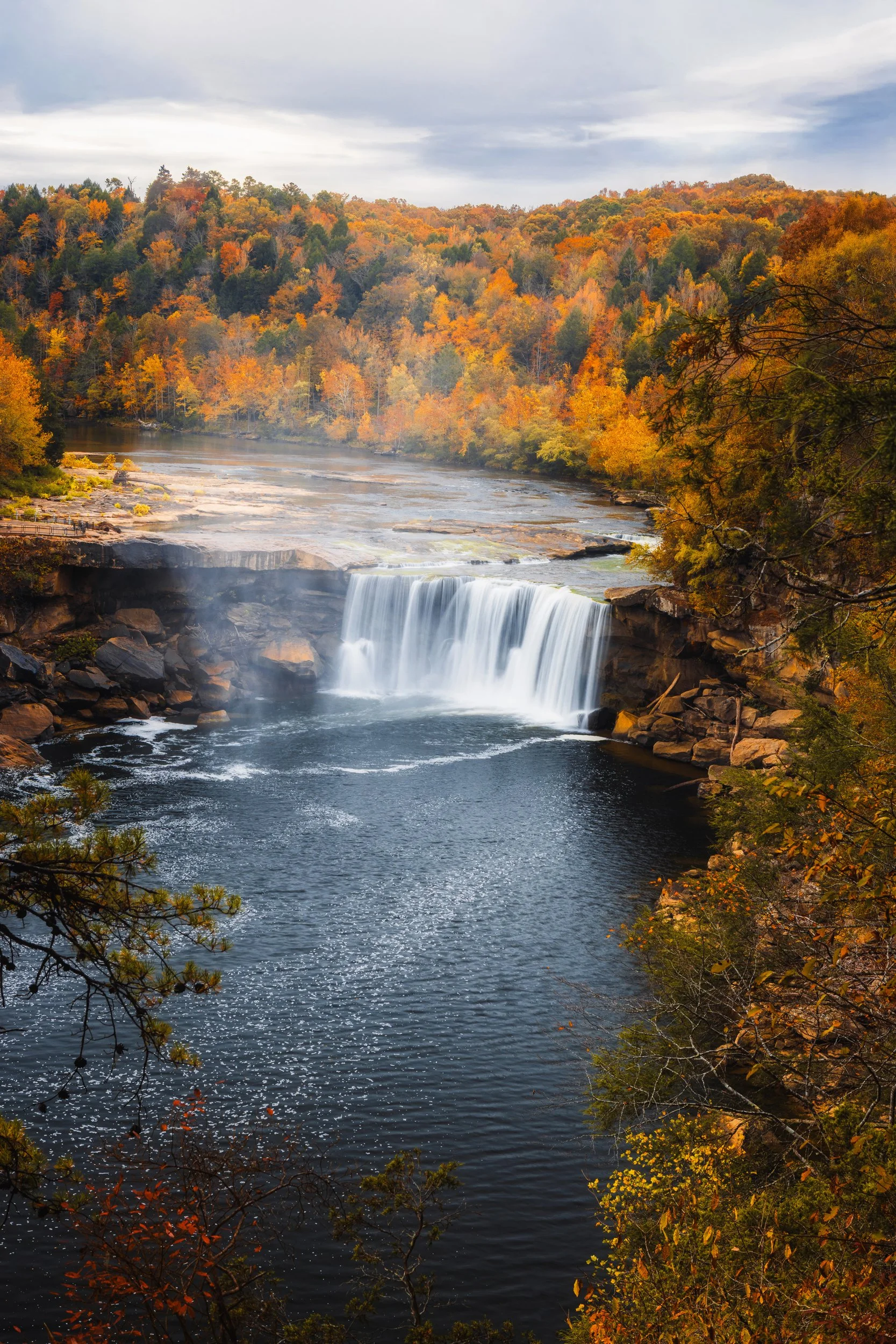 Autumn color framing Cumberland Falls seen from the Eagle Falls overlook, Kentucky, by Ryan L. Smith