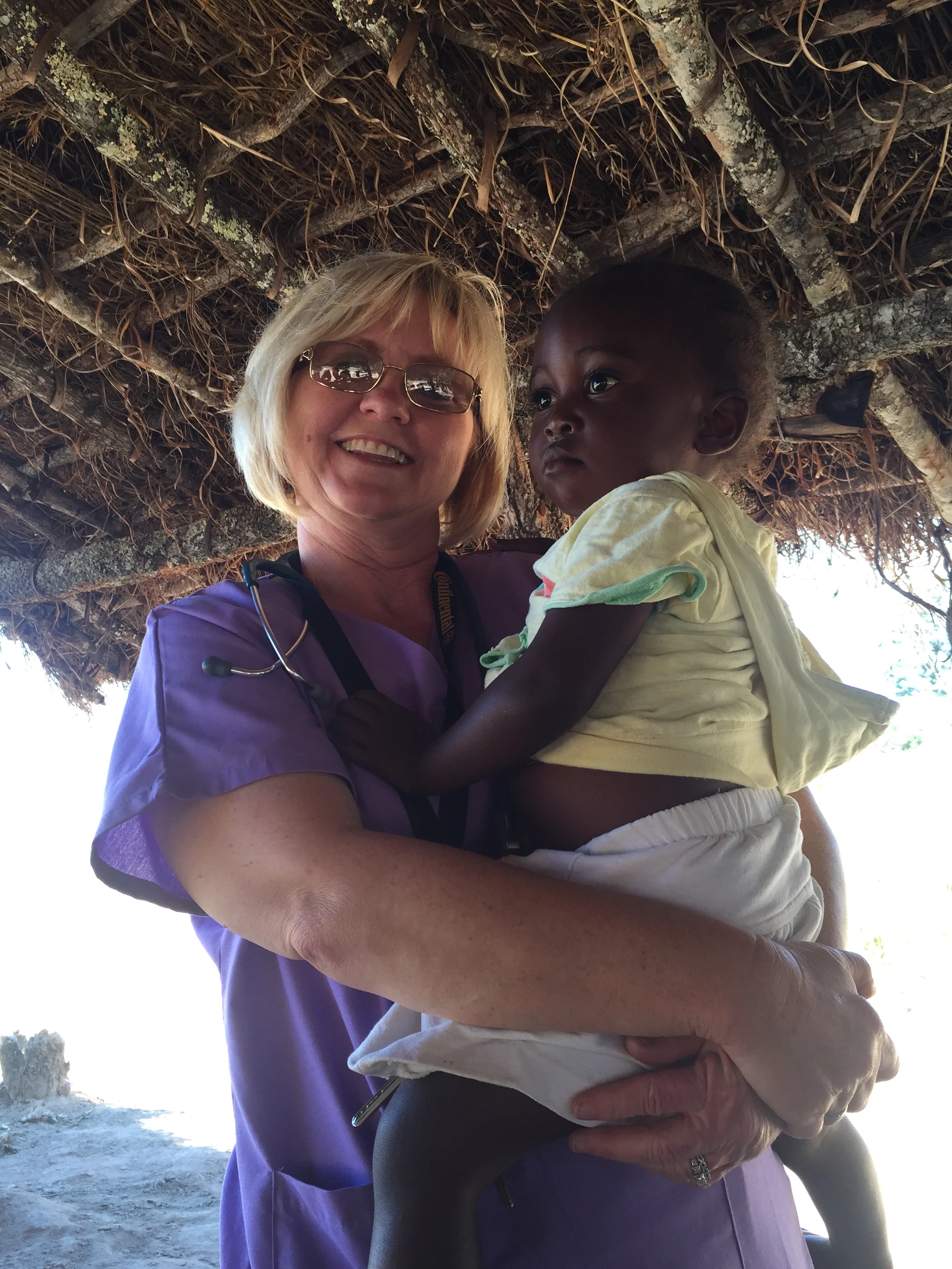 Sherrie with a child.jpg