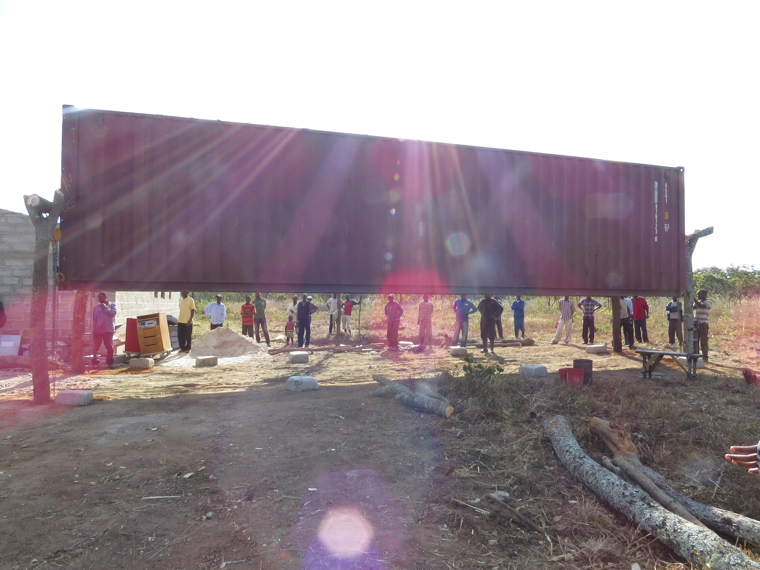 Lowering the container to the ground