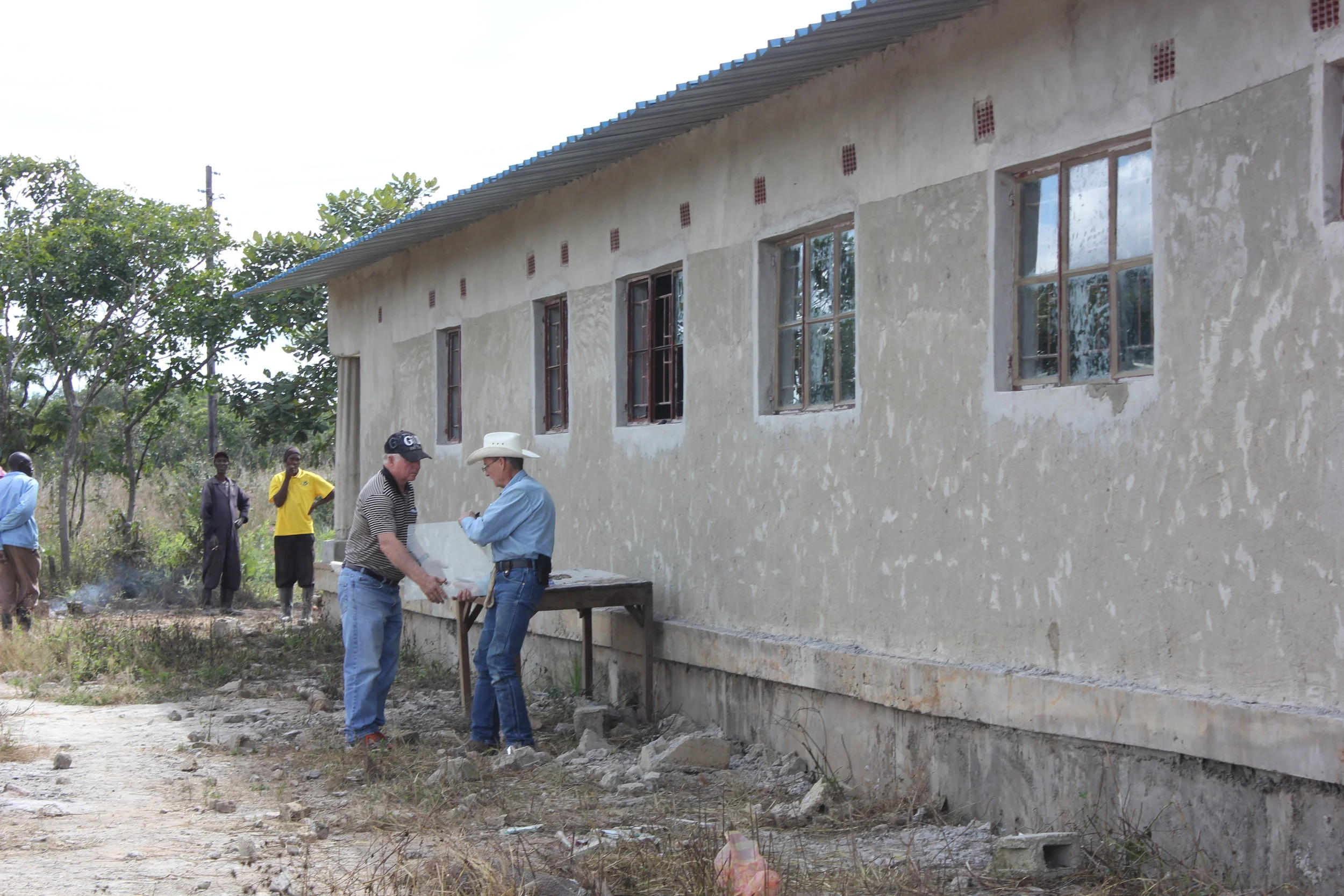 Putting the Glass in the window at Clinic of Hope