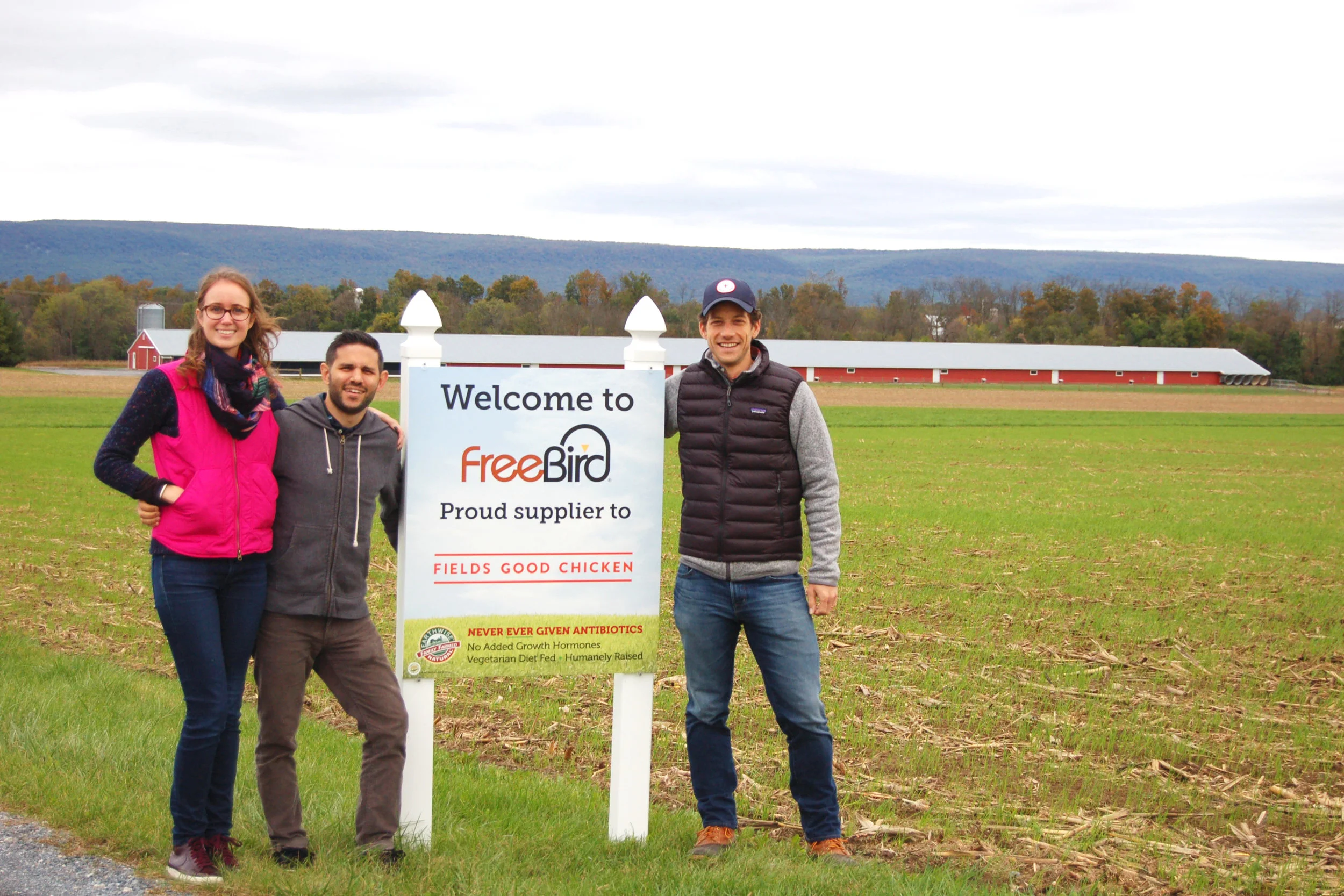 Phoebe, Josh, and Field visiting FreeBird's farms.