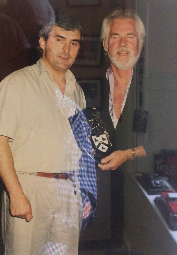 Making a presentation to Kenny Rogers on his first tour of Ireland promoted by KCP