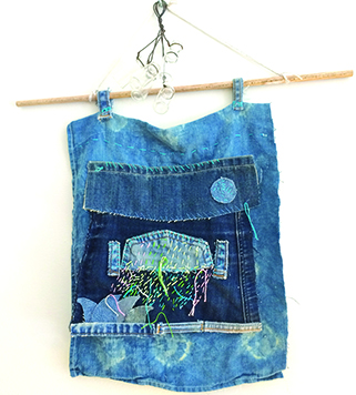 upcycled denim and embroidery wallhanging