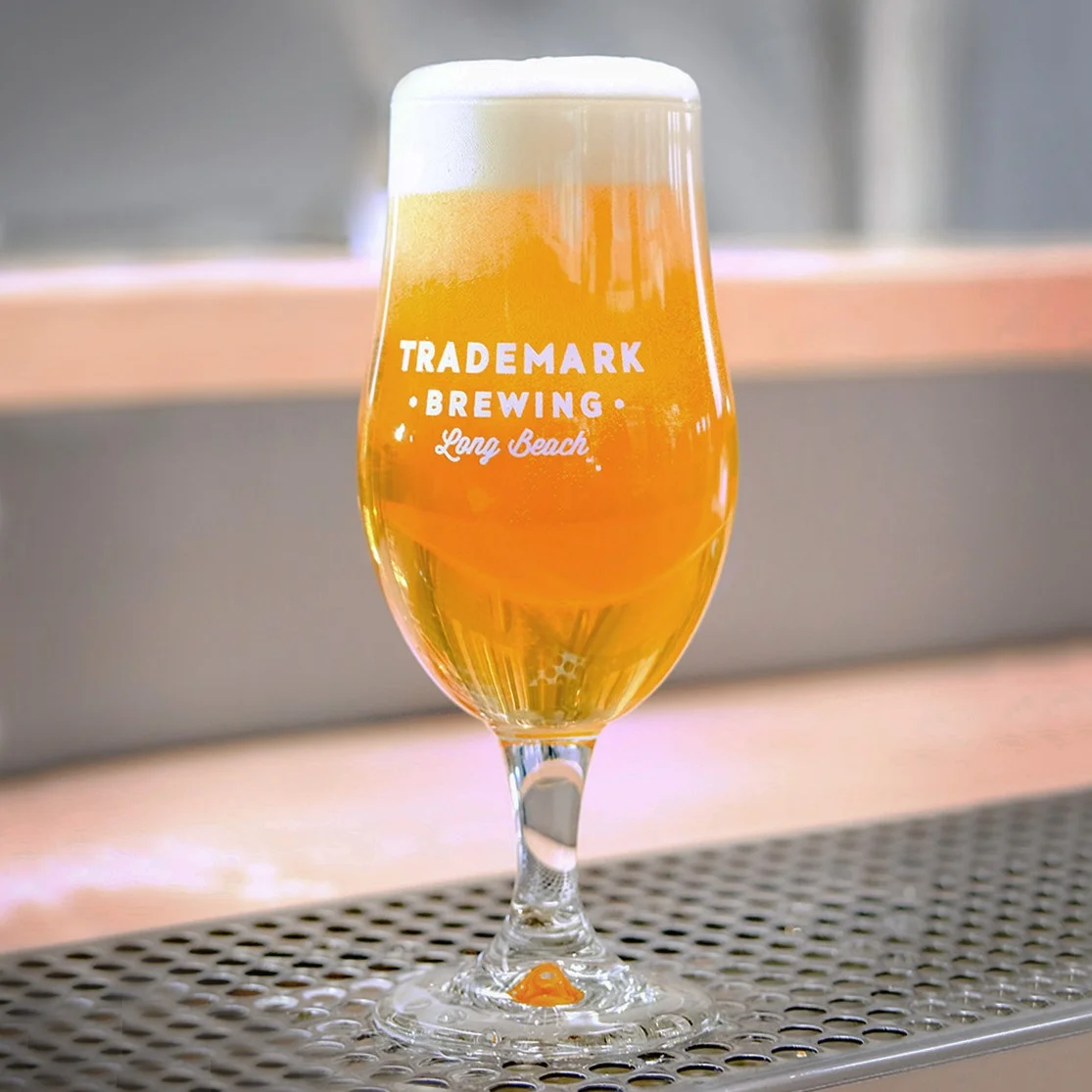 Glass of Ascending Percussion Kolsch beer.