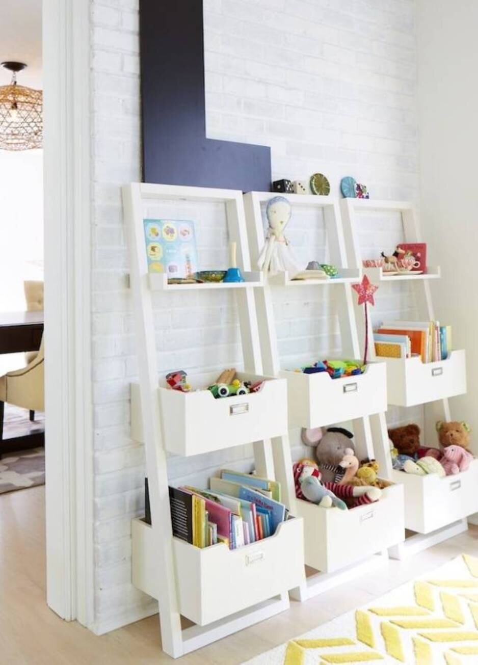 We love this idea! Not only does it give each toy a home but it’s also a place to display toys to encourage playtime over screen time! Via: Home BNC