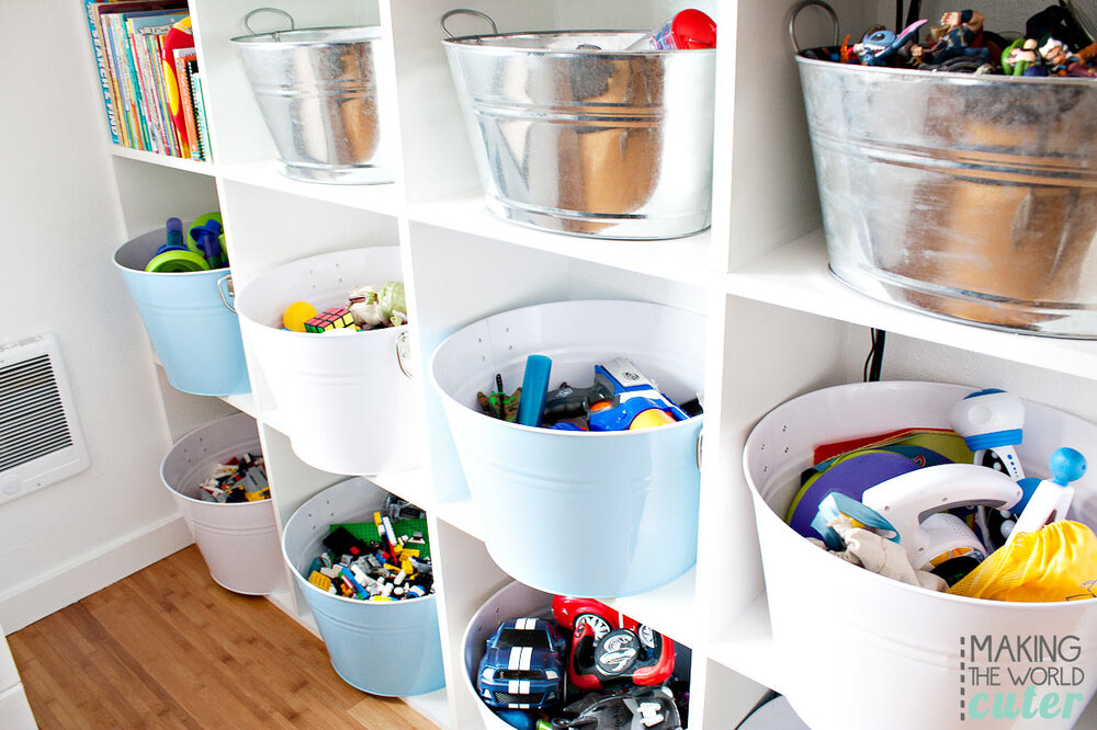One of the easiest and most efficient ways to organize kids play areas is BINS! Even if you don’t have shelving to place them in or on, it’s a simply way to have a designated home for each toy. You can even take it a step further by labeling or using each bin for specific toys! Via: Home BNC