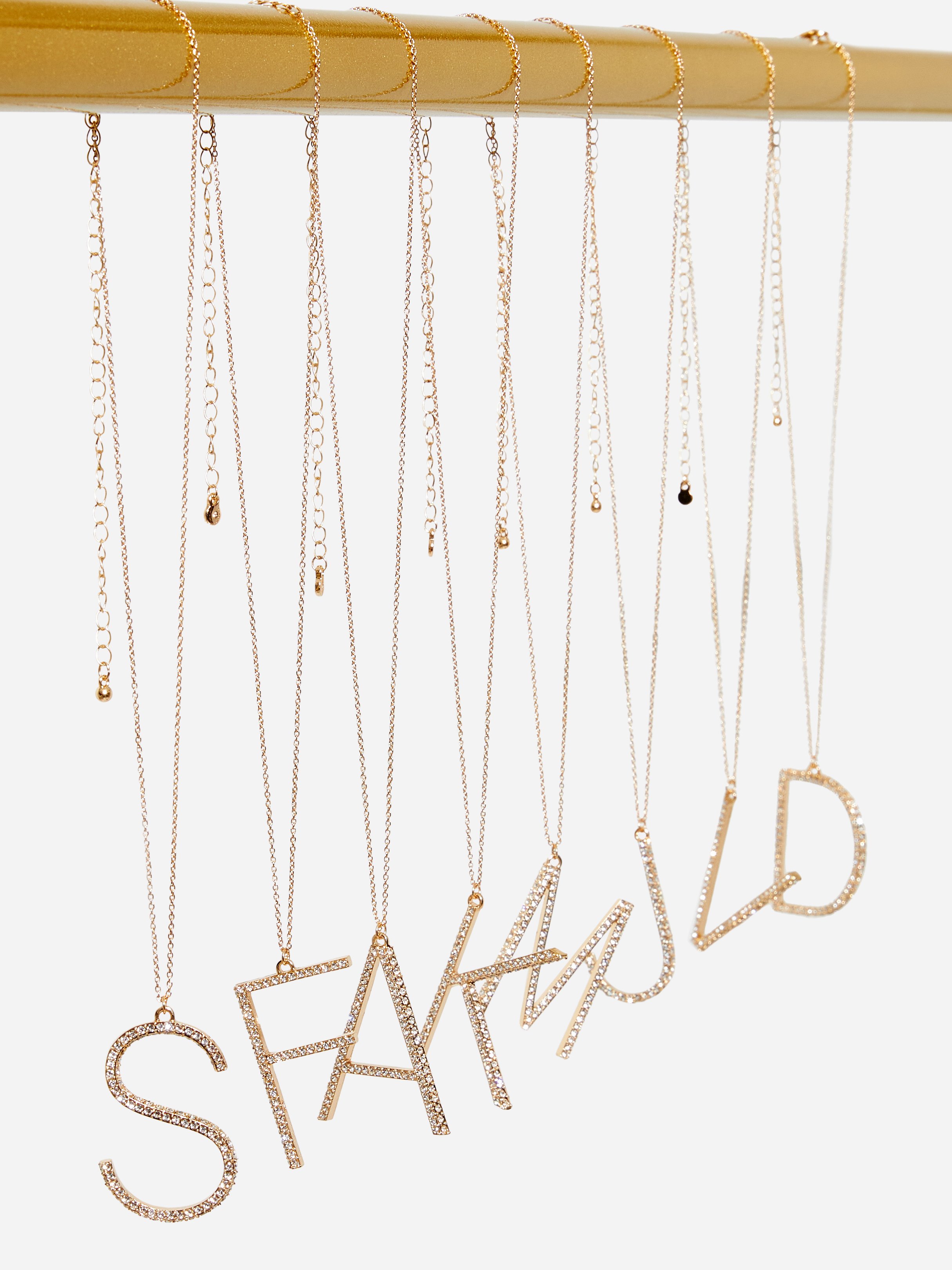 AS hanging letter necklaces.jpeg