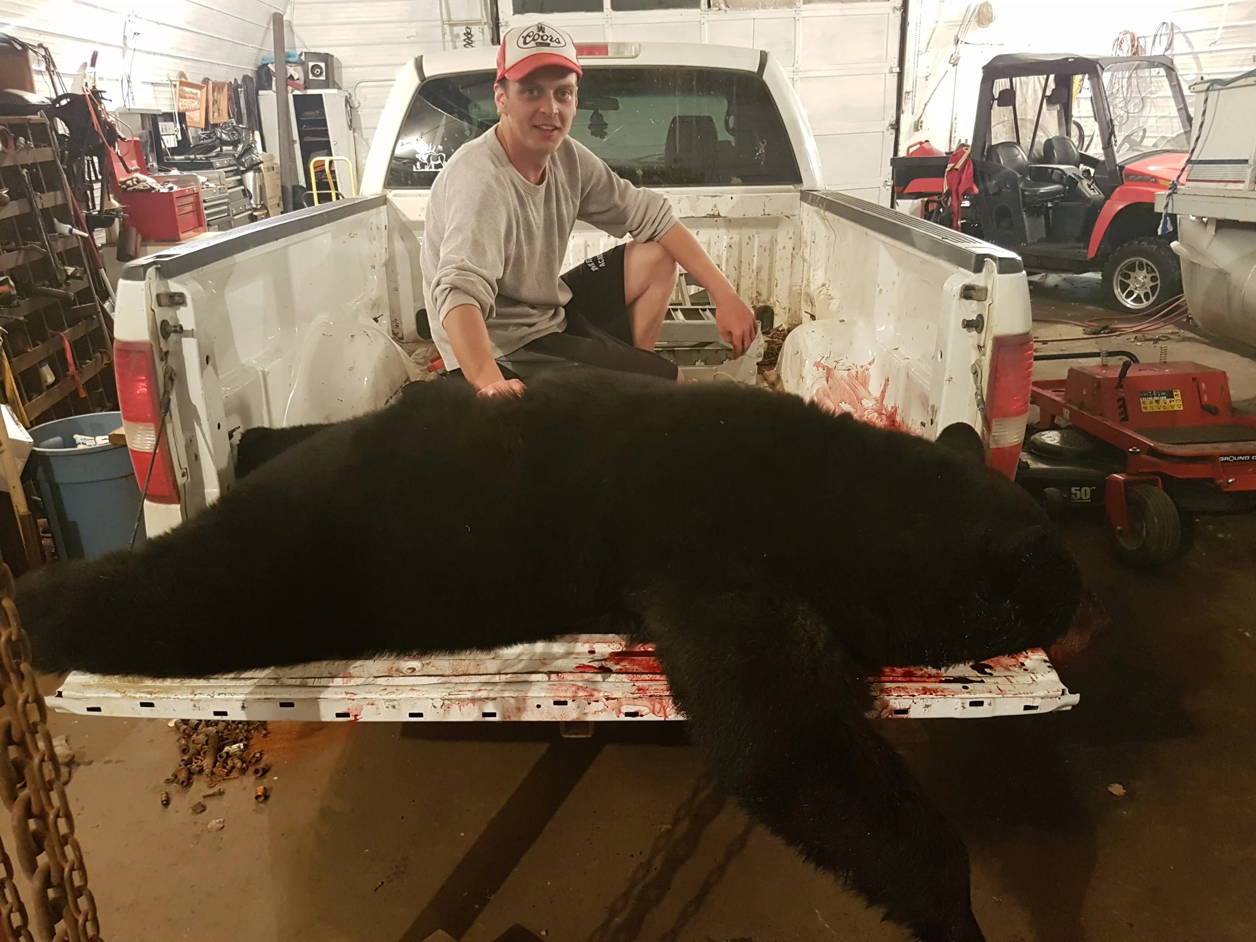Kale Wright with his beautifully furred mature boar, 2017 Spring Alberta Black Bear.