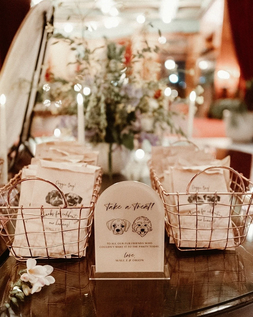When pups are your babies, it's always fun to think of creative ways to incorporate them into your special day. H+H opted for &quot;doggy bags&quot; filled with treats for pups that guests could take home to their pups who would be waiting for them a