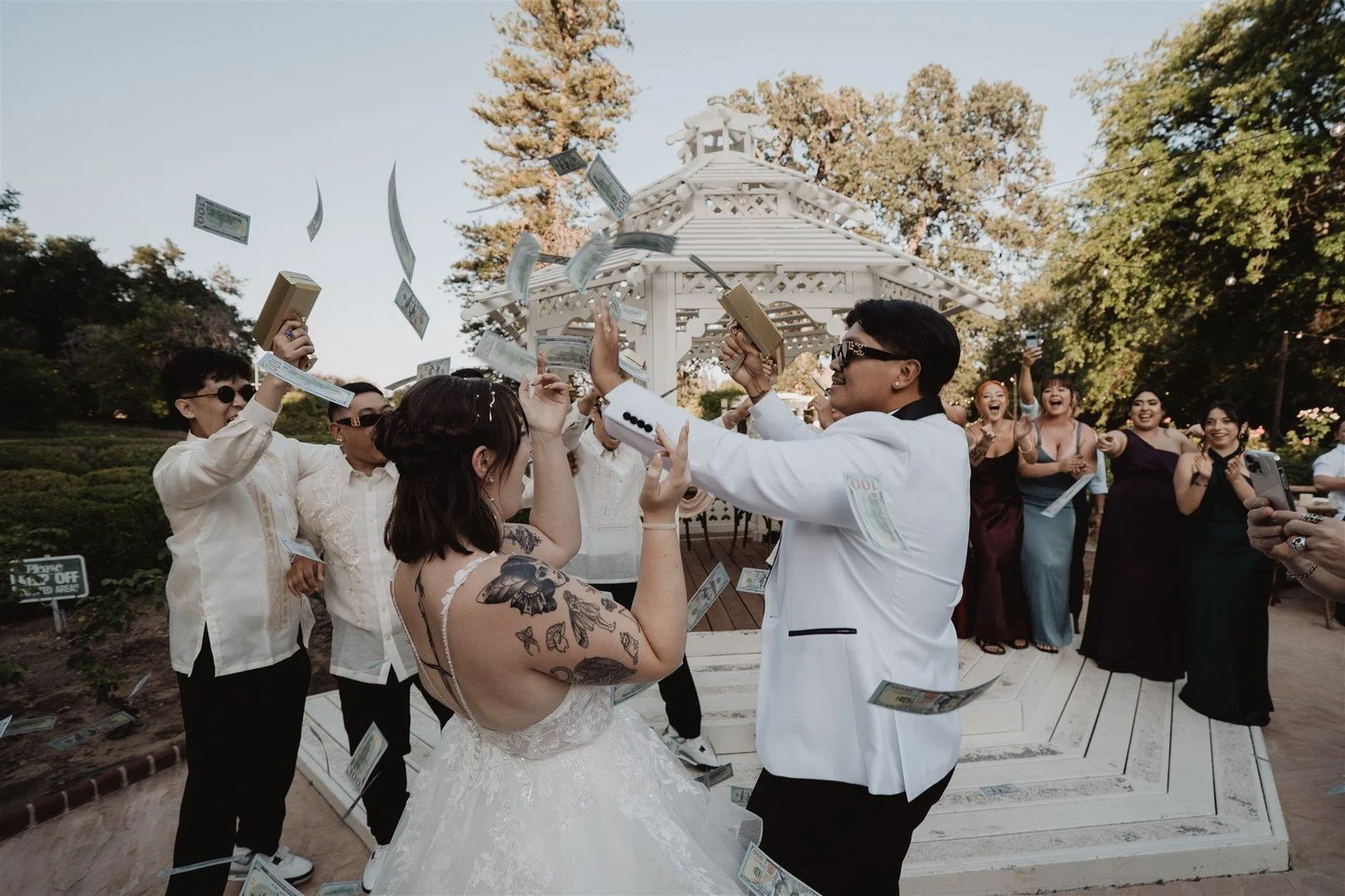 When the wedding party decides to surprise the newlyweds by making it rain during their Grand Entrance, you get epic action shots like these. This was so fun to watch in person, and it's so fun to look back on and remember! 

@orcuttranch.rental @mbm
