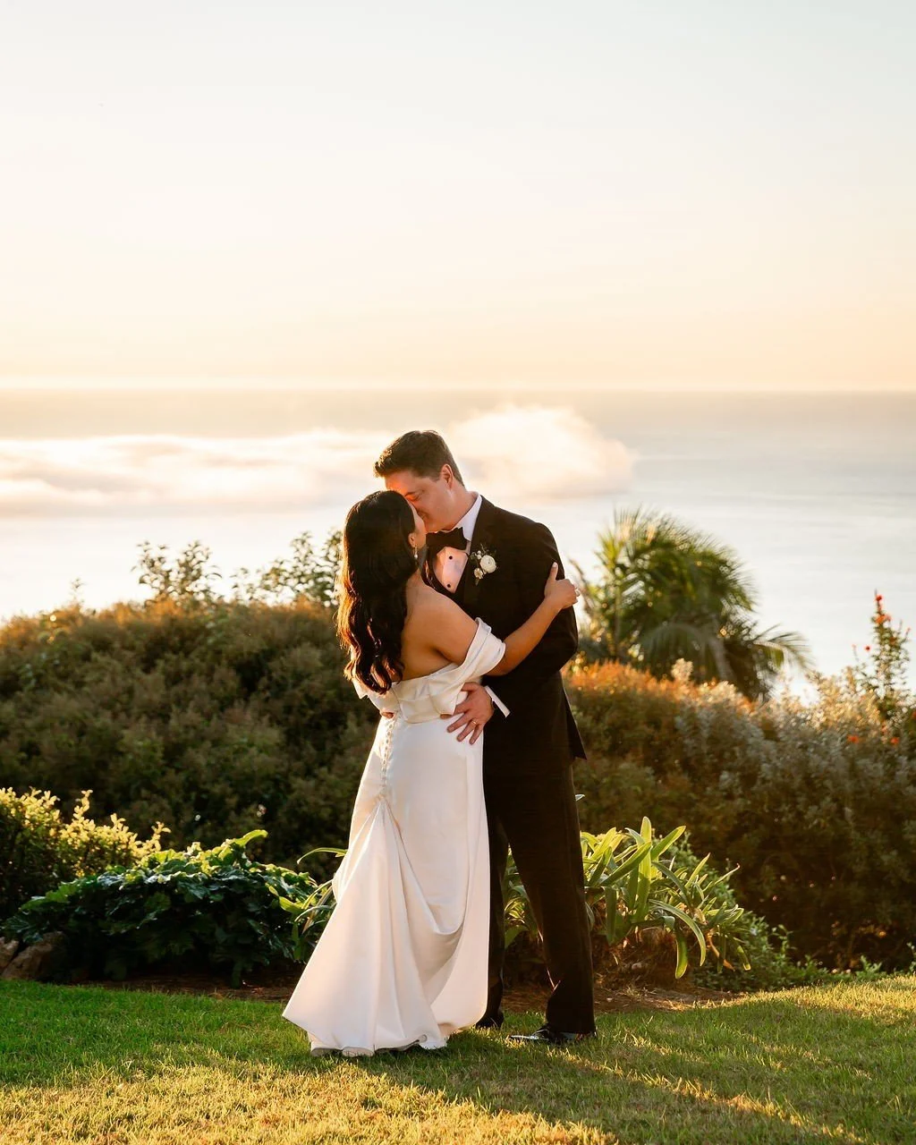 Kiss at sunset, above the clouds overlooking the ocean. We loved the sweeping views found at La Venta Inn for this sweet couple's wedding day. 

@laventainn_pv @afabsoiree @madebymegcatering @susiecakesbakery @voxdjs @lc.floral.designer @angelatamtea