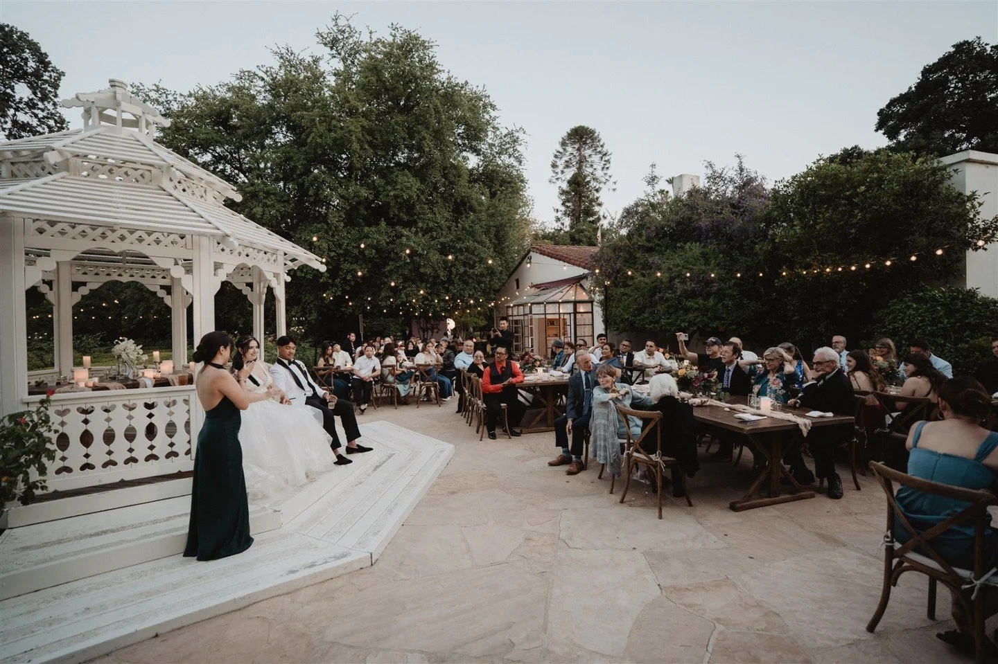 At Orcutt Ranch, placing a sweetheart table inside the gazebo allows the couple and their guests the best views of each other. But it may not be the best for events like speeches. 

So when it came time to give toasts, we pulled out the couple's chai