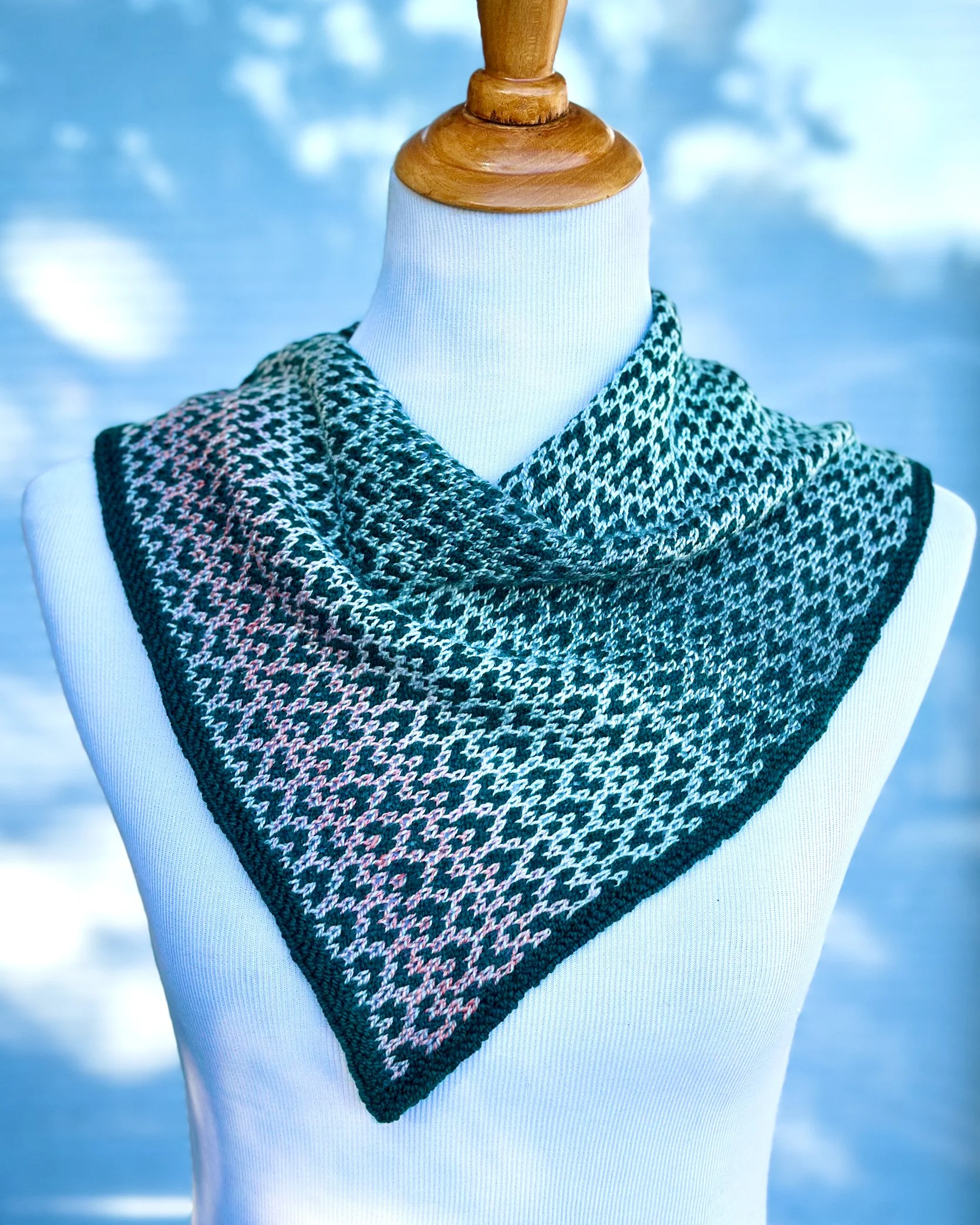 Crystal Lake Cowl, an easy colorwork scarf knitting pattern, with only 1 color of yarn used per row shown using Spincycle Yarns Dyed in the Wool gradient for the contrast color.