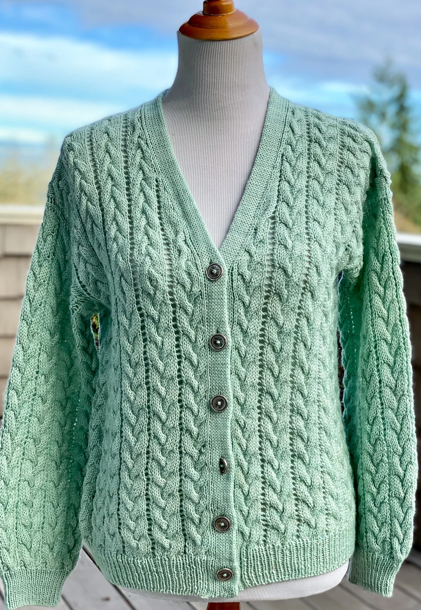 Multnomah Falls Cardigan Knit Sweater on mannequin in sport weight yarn.